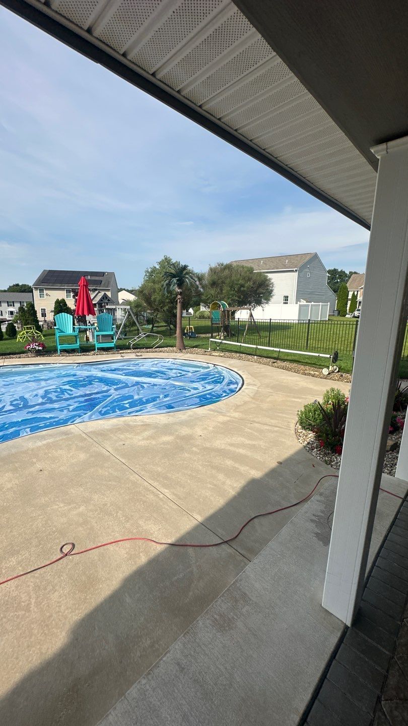 Twilight Pool Deck / Patio Project in Beaver falls by Floors in a Day, Inc