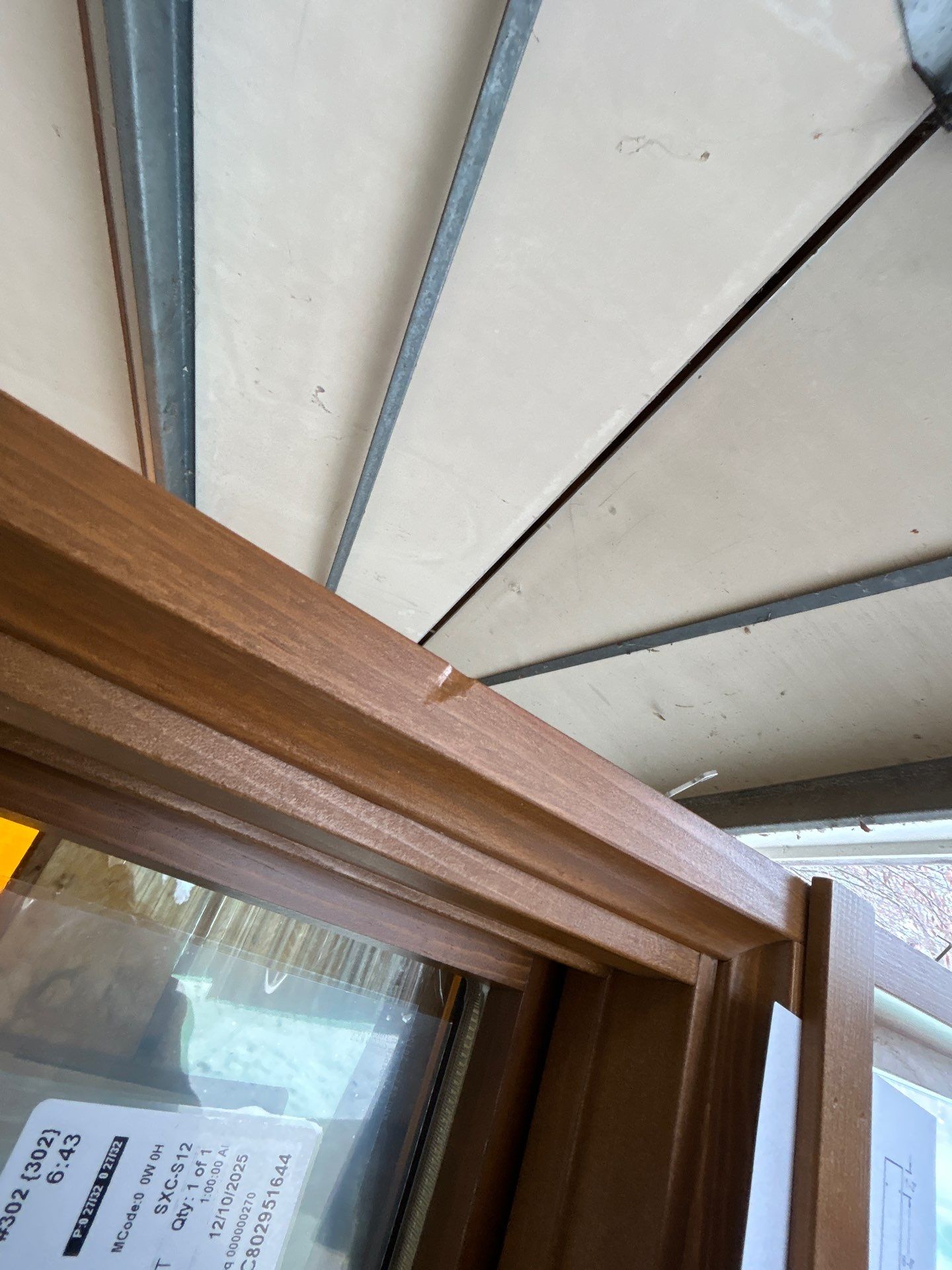 Black-Frame Pella Lifestyle Upgrade on a Partial Brick Home by United Windows and Siding LLC