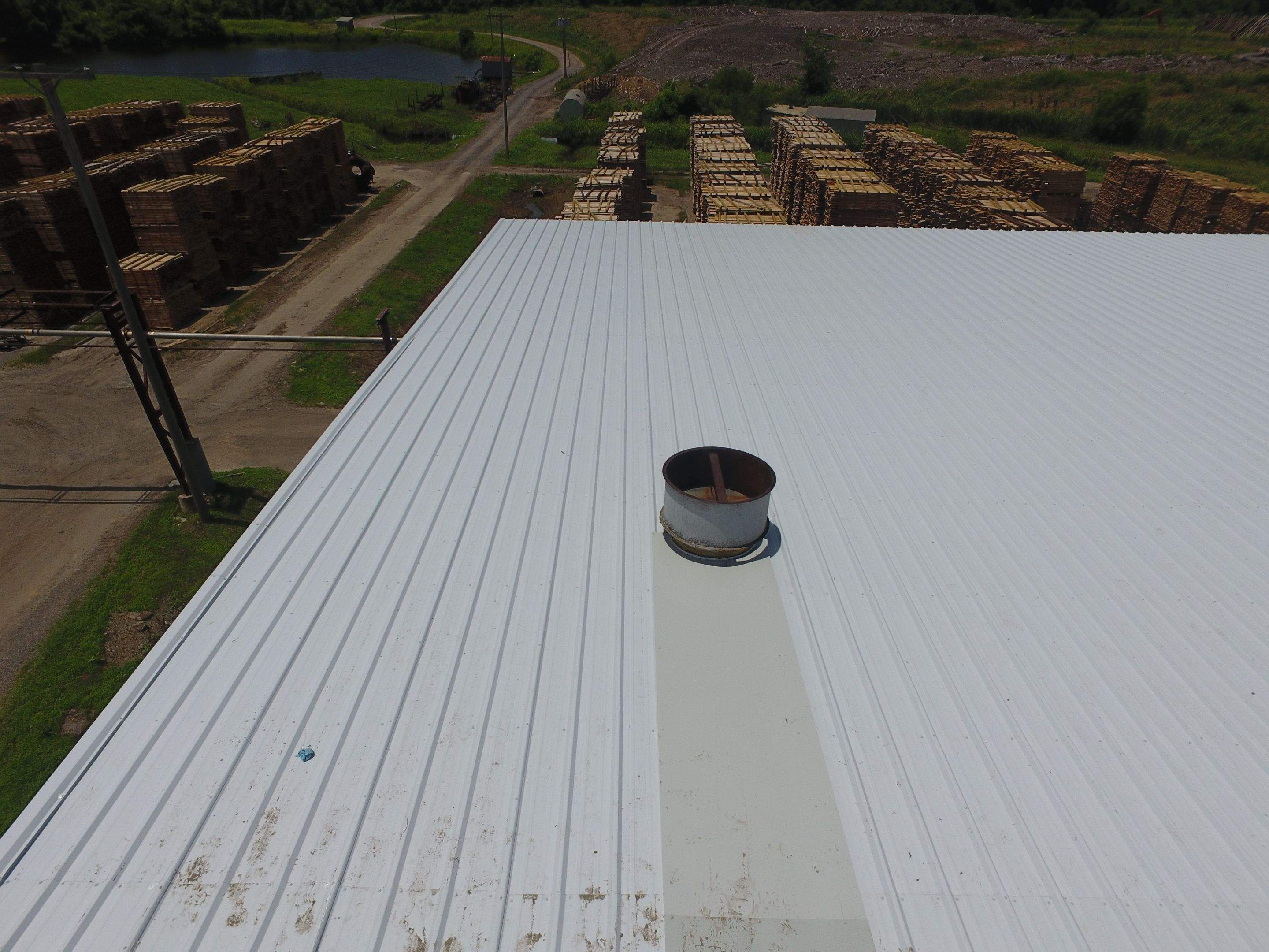 Commercial Roofing Installation using Aluminum Roofing panels by Hostetler Roofing