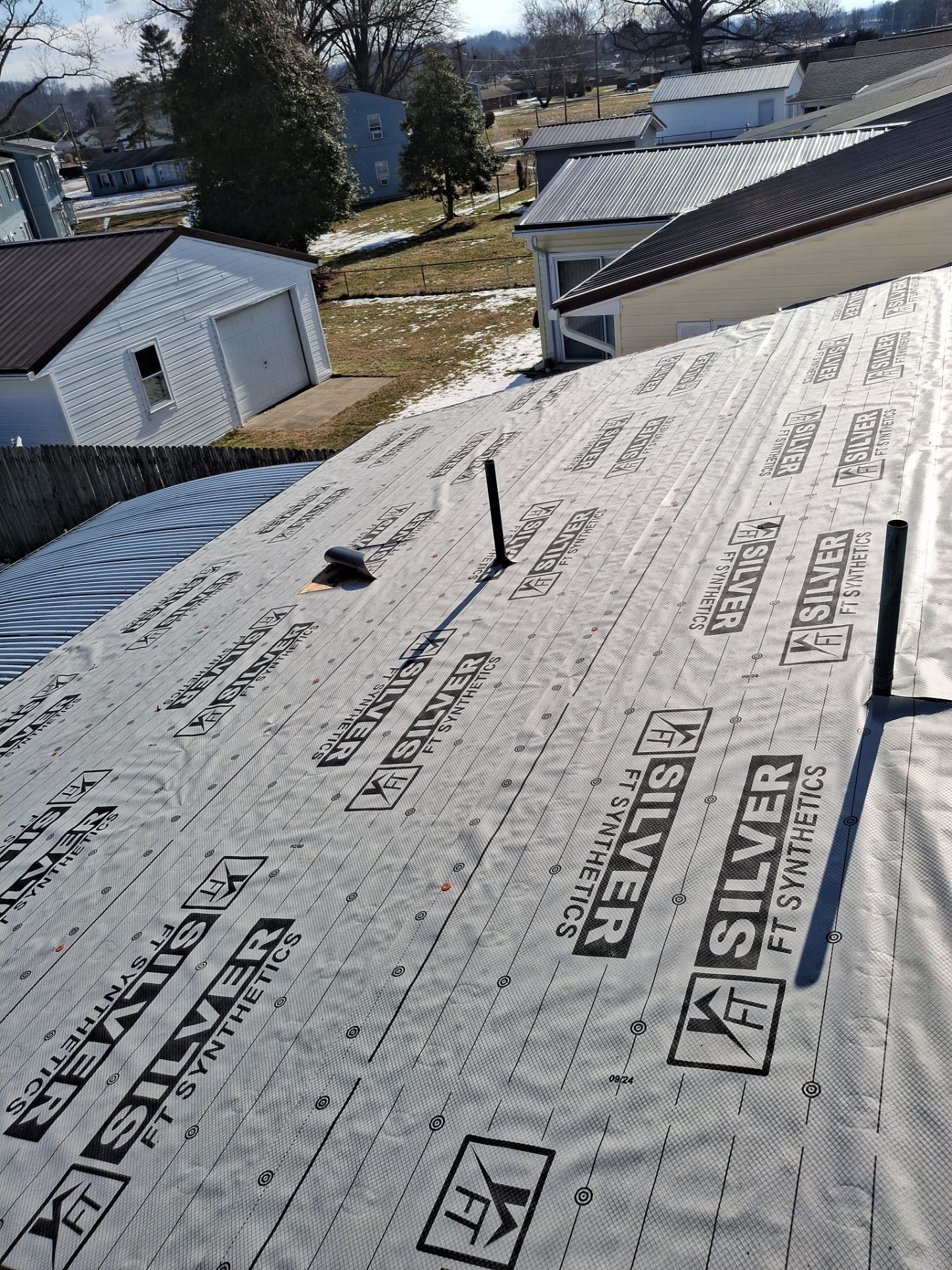 Residential Roofing Installation using Metal by Rainstoppers Roofing