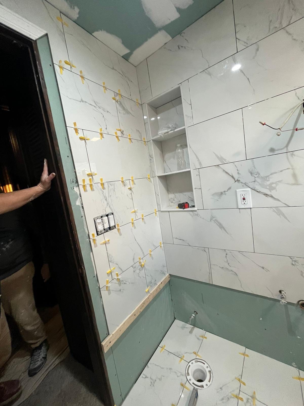 Bathroom Remodel using Tile by Home Concepts Construction