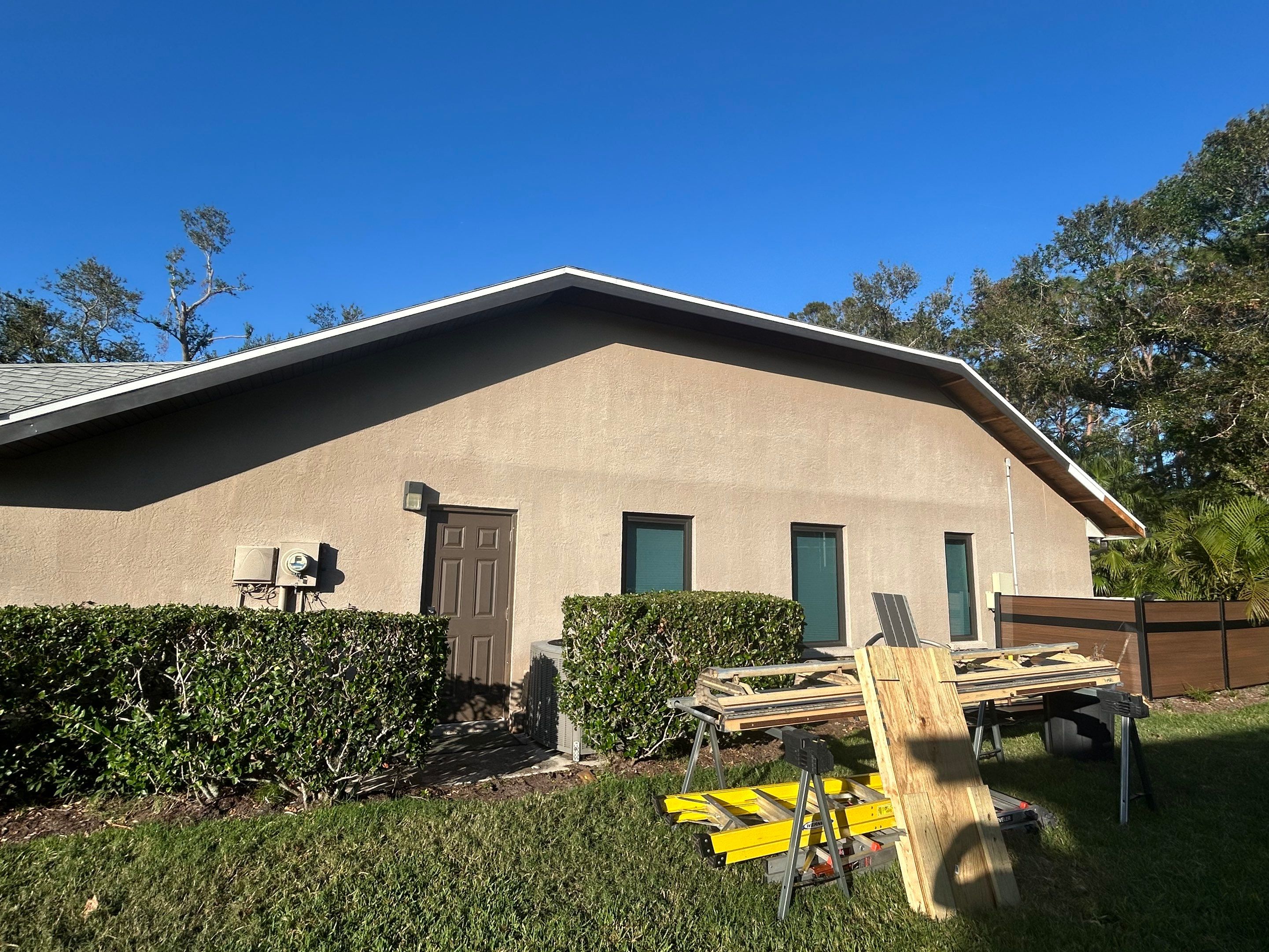Black Seamless Gutters in Sarasota FL by Gutter Professors