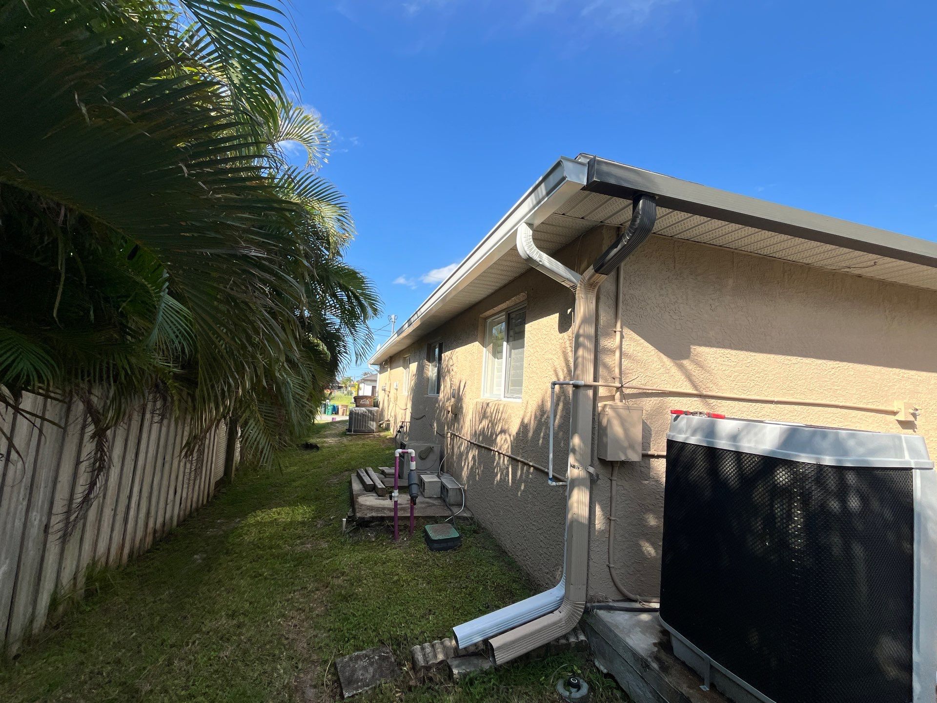 Downspout Extensions for Cape Coral Homes  by Gutter Professors