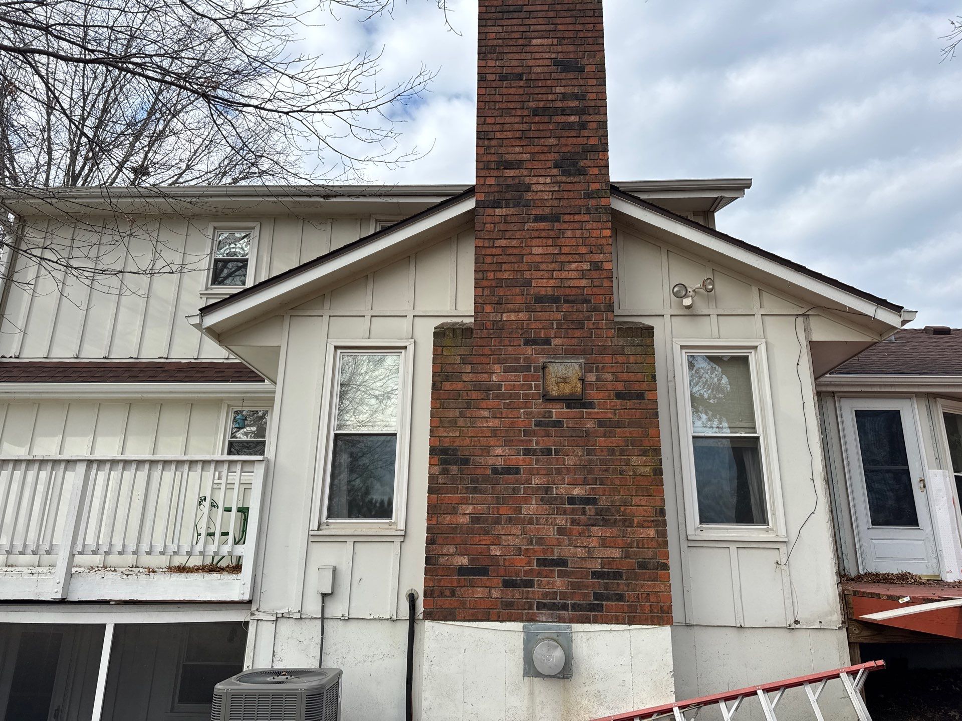 Siding Installation using Exterior Portfolio Vinyl Siding in Raymore Mo  by EEC  Windows, Siding & Roofing 