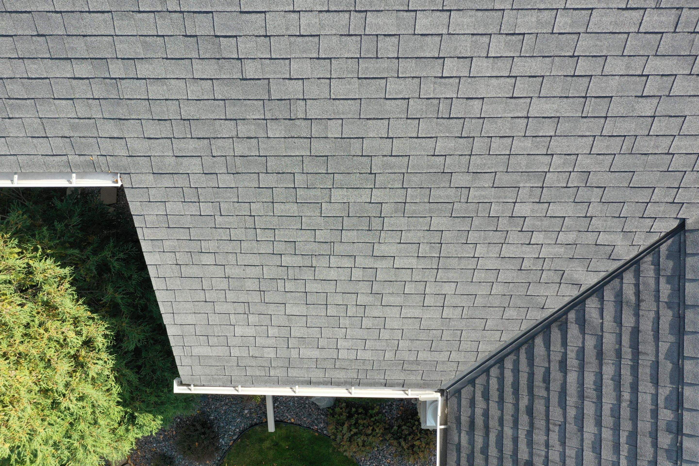 Residential Roofing Installation using Certainteed Landmark Moire Black by MODERN EXTERIOR SYSTEMS