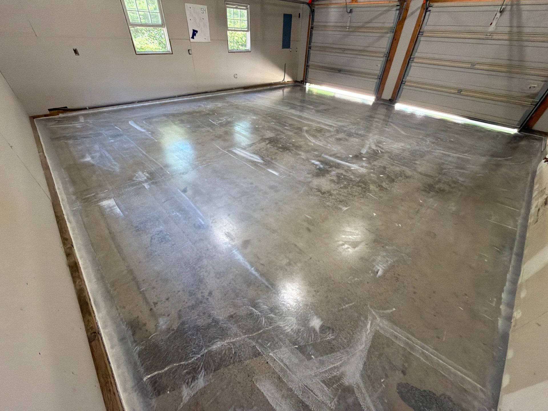 Garage Epoxy Floor Coating with Speckled Flake Finish in Fruitport by Gordon Painting