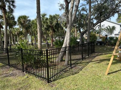 Aluminum Fence Installation using Black 3 Rail Aluminum Fence
