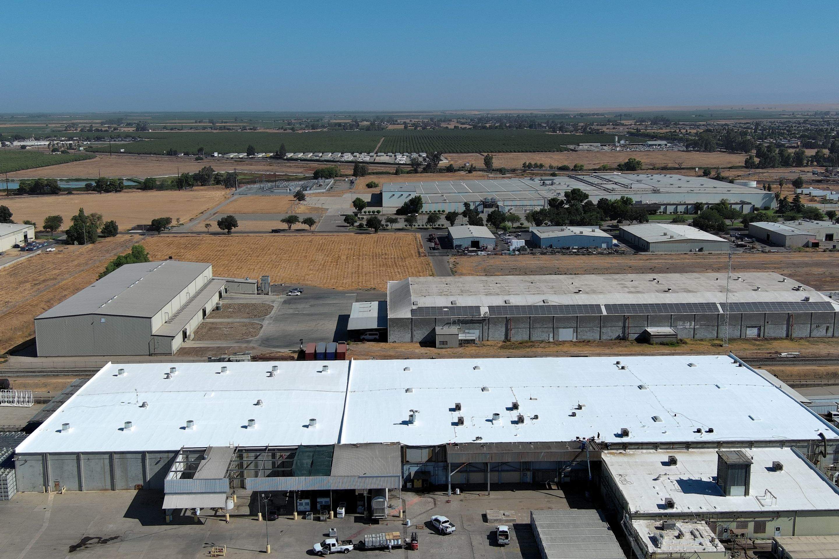 Pro Farms Spray foam roofing project by Straight Edge Roofing Inc