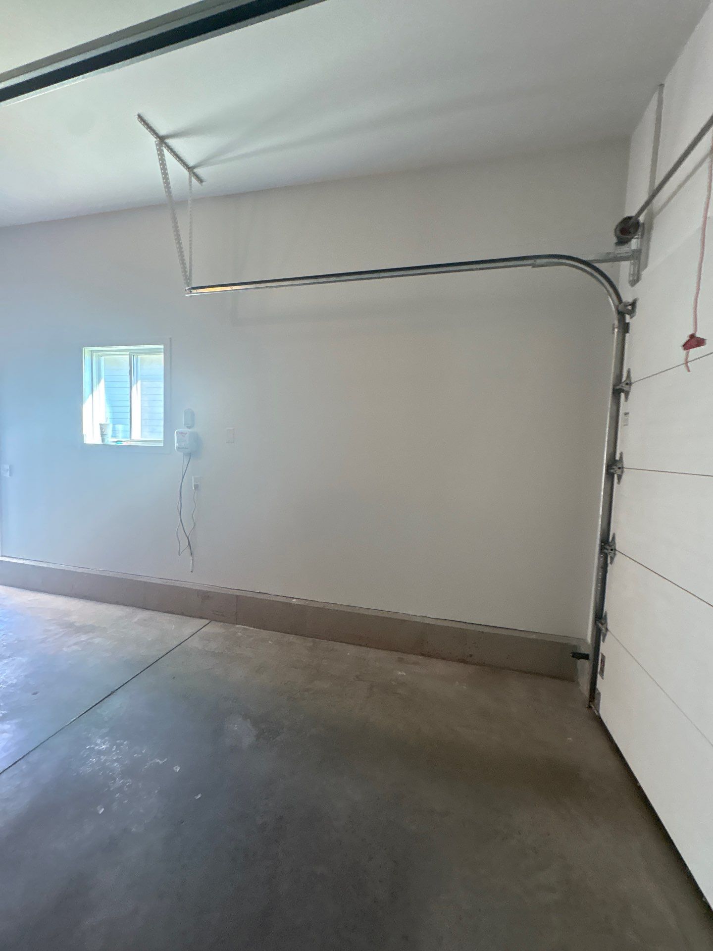 Full Garage Interior Drywall Finishing and Priming in Sioux Falls by Select Painting, Coatings & Garage Cabinets