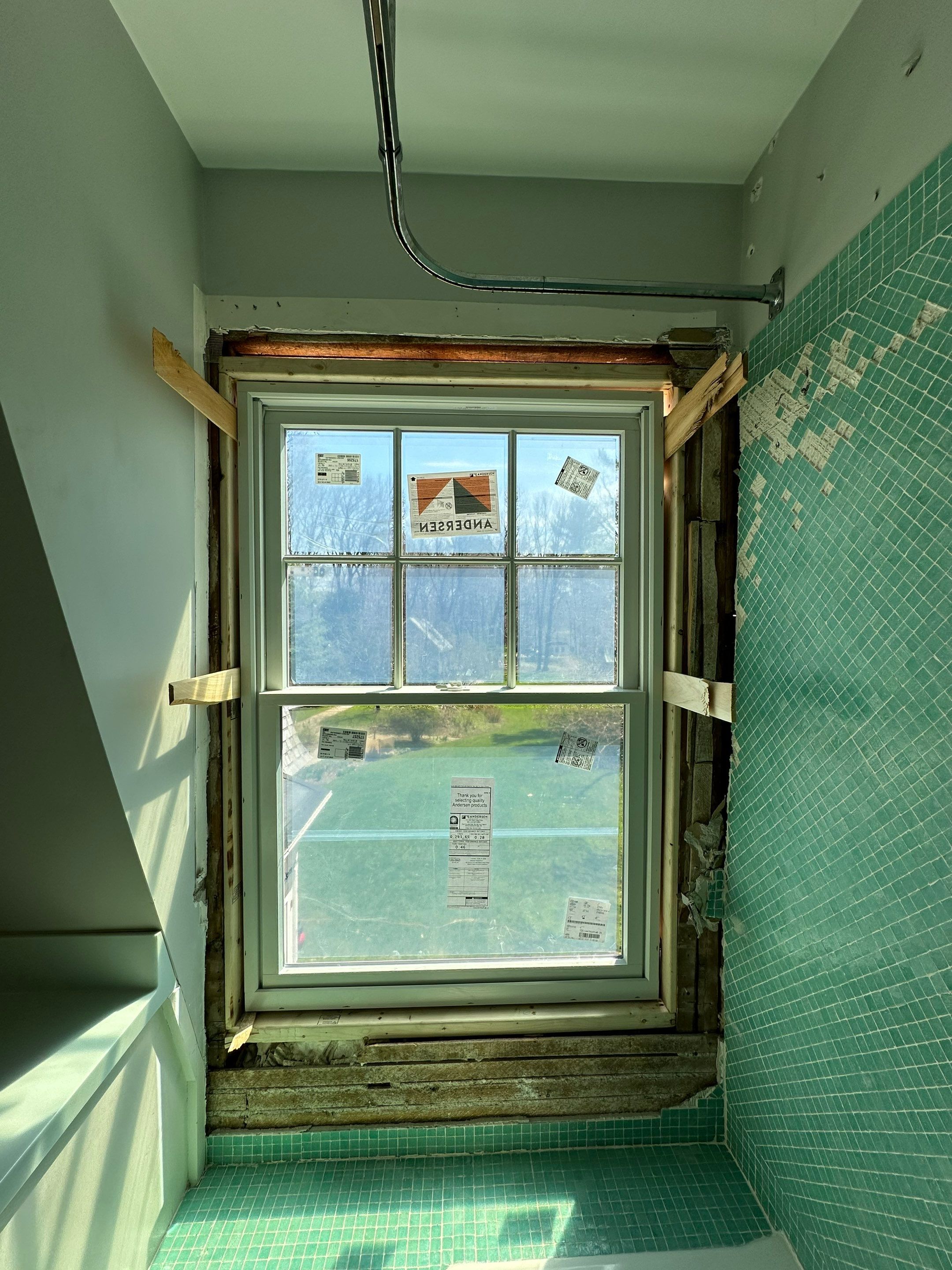 White cedar shingles and windows in Wayland, MA by UBrothers Construction