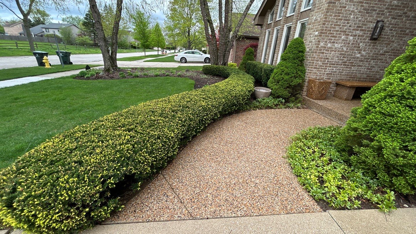 concrete patio and driveway cleaning by Northern Power Washing LLC.