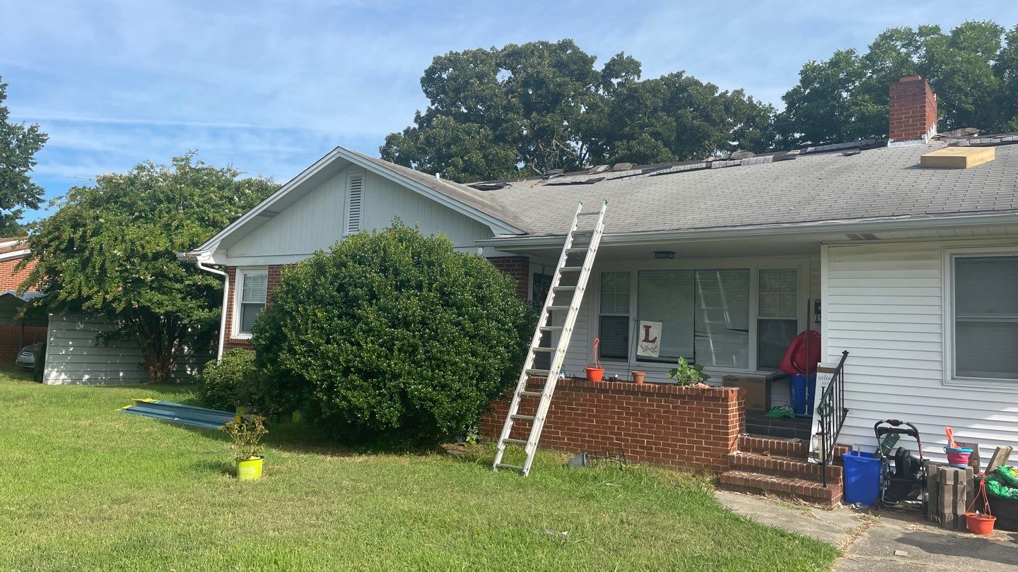 Carolina Blue Standing Seam Roof by Just In Time Roofing and Restoration