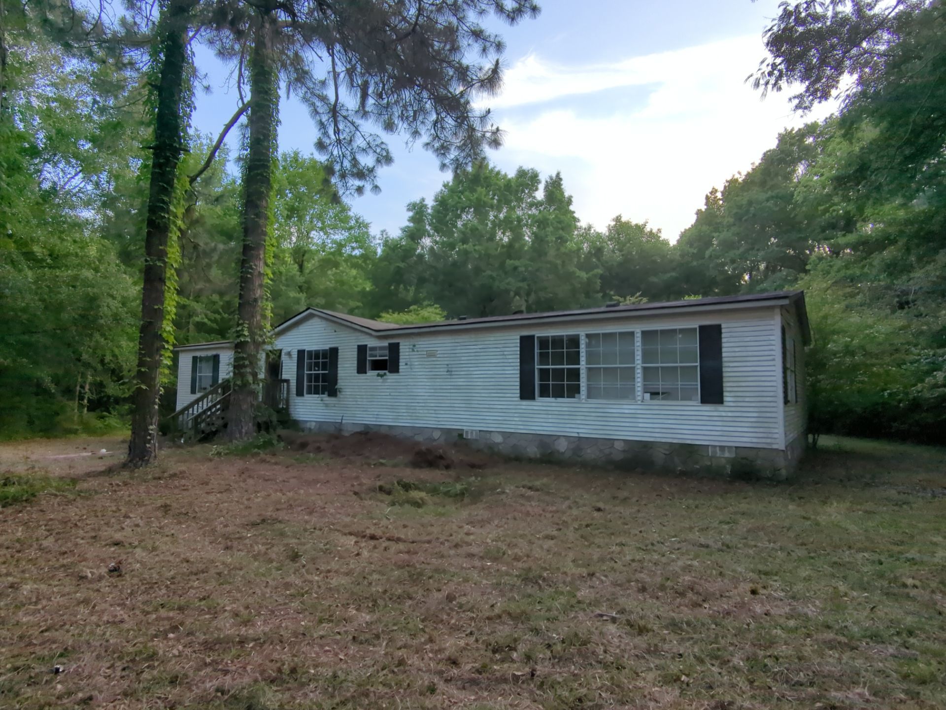 Exterior Clearing - tree trimming - grass cut by Swift Signings and Services LLC