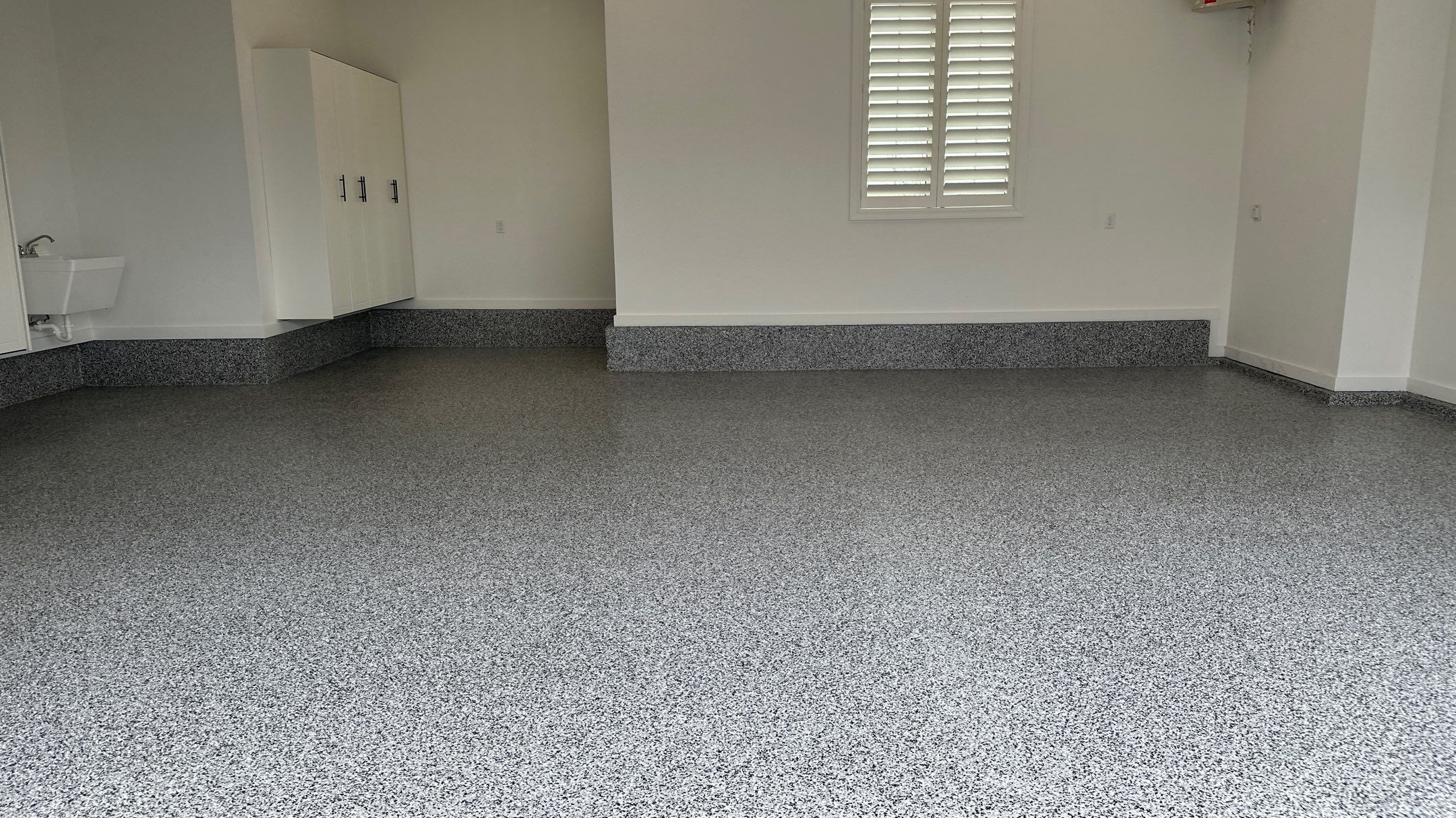 Mike & Pam transformed their garage with a Banner Garage Floor and Cabinets by Banner Garage