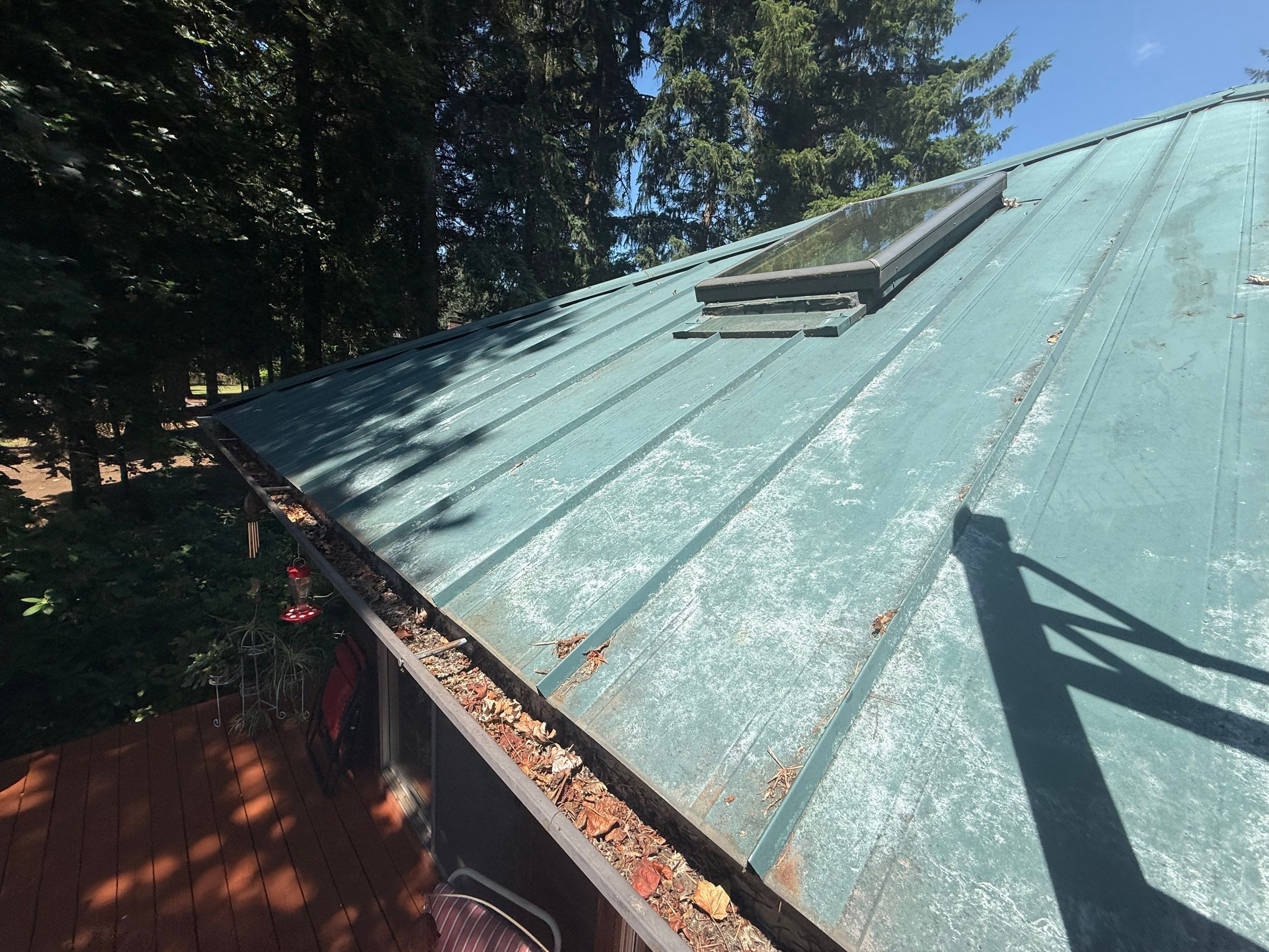 Log Cabin Metal Roof Repair and Skylight Maintenance in Springfield by BEST Roofing & Waterproofing