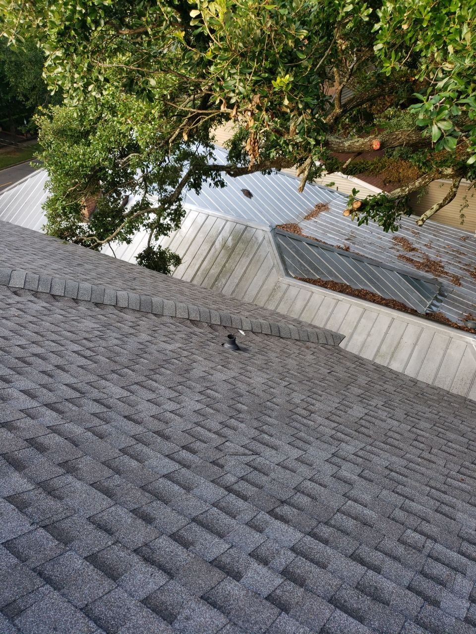 Residential Roofing Installation by American Roofing & Construction LLC