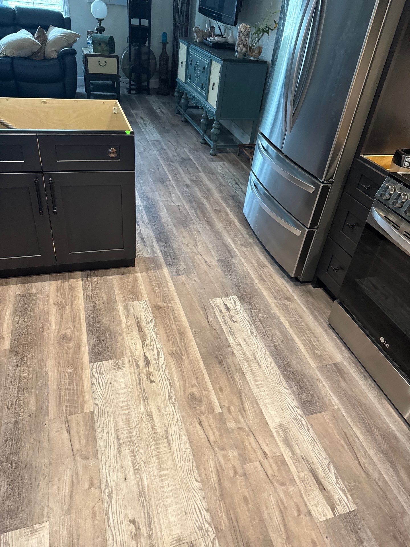 LVP kitchen floor upgrade by Vrmmm Flooring