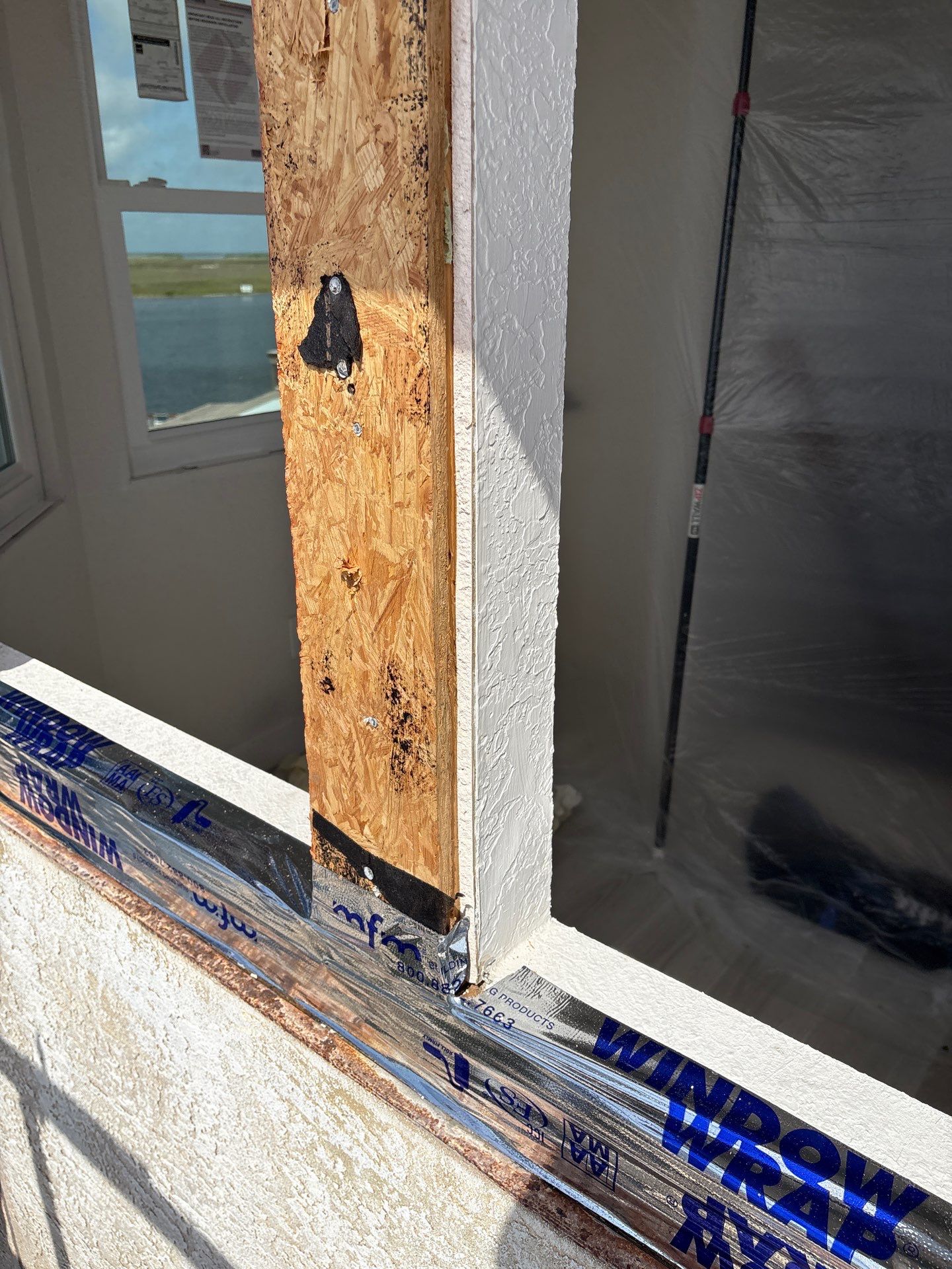 Installing Windows on a Submarine  by Bayfront Roofing and Construction
