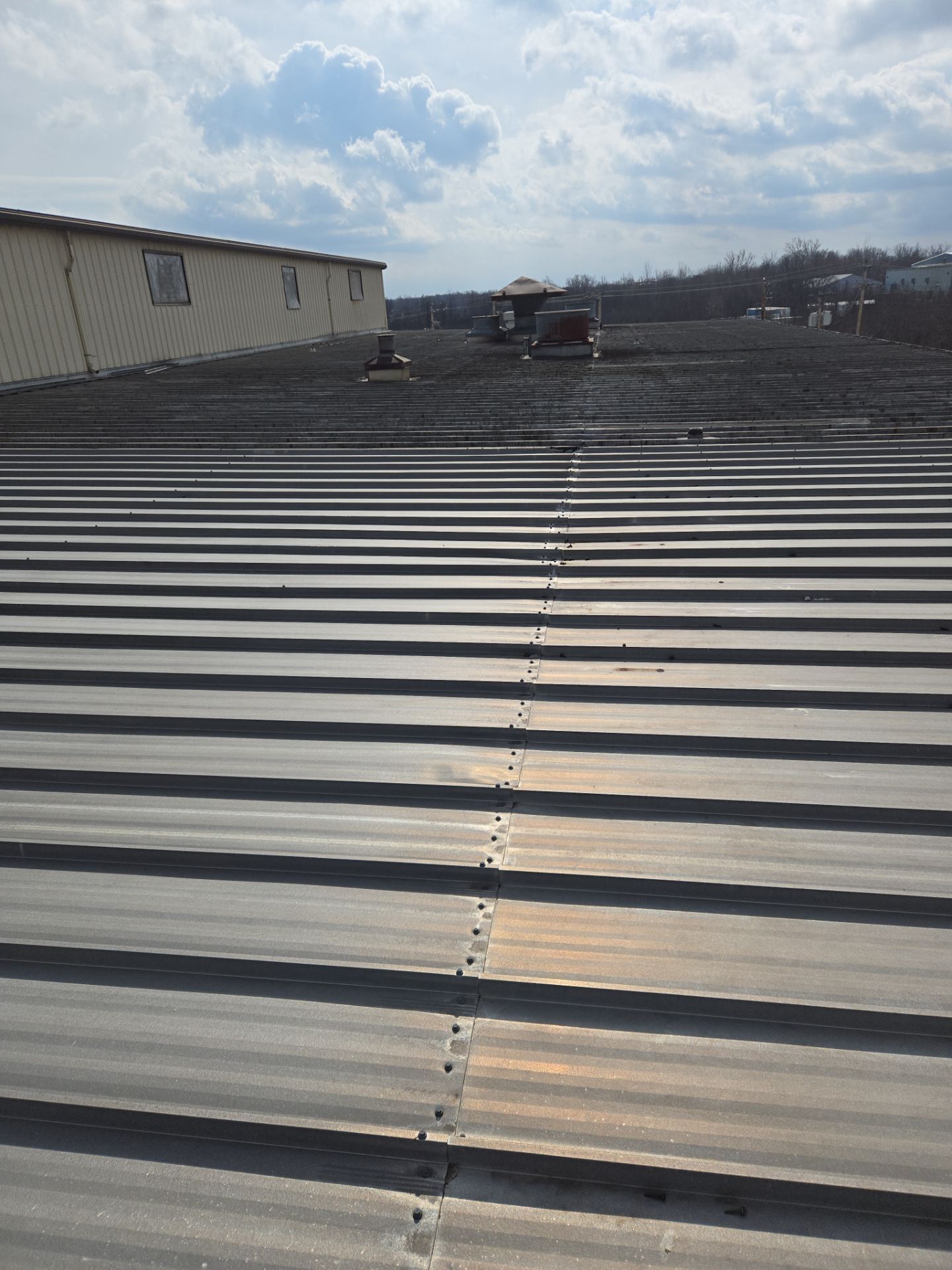 Commercial Metal and Flat Roof Repairs in Mason, Ohio by Level Up Roofing and Restoration Services LLC