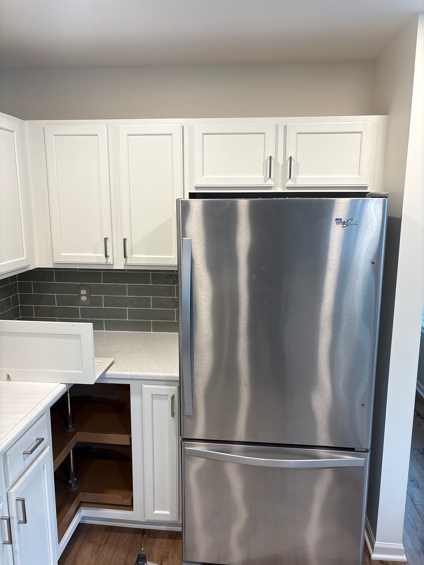 White Shaker Cabinet Installation and Quartz Countertop Replacement in Rochester by Top Shelf Painter