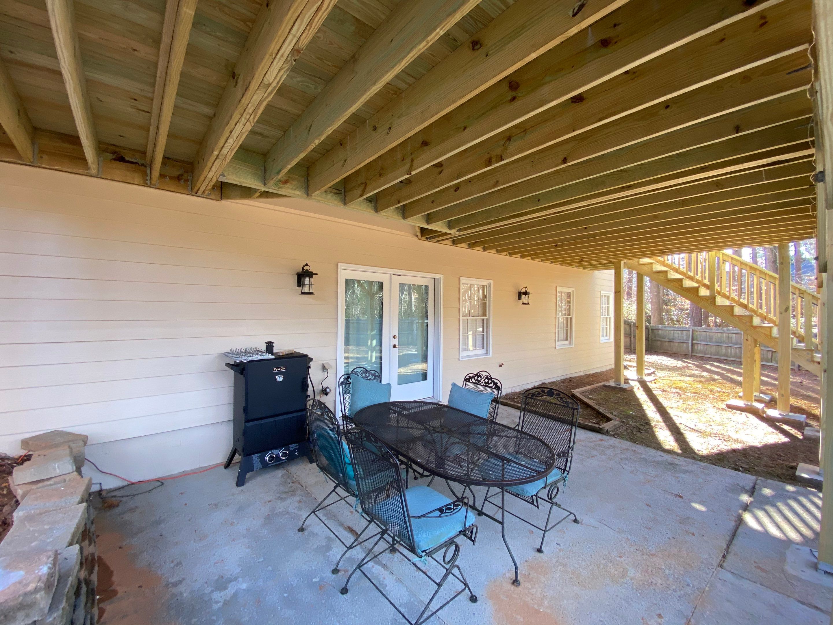 Elevated Pressure-Treated Wood Deck Replacement and Staircase in Duluth by Swift Home Renovations