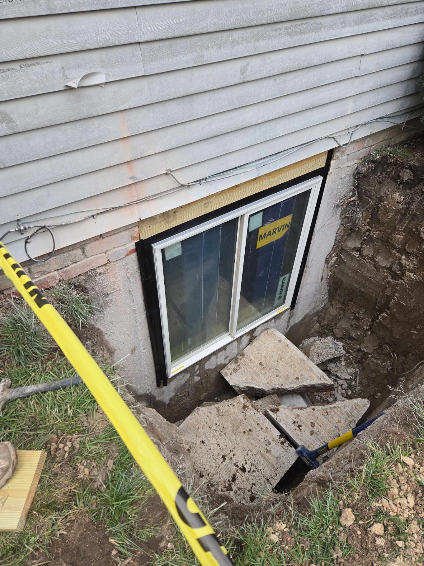 Egress Window Installation with a Premier Basement Egress Window Kit by Toledo Basement Repair