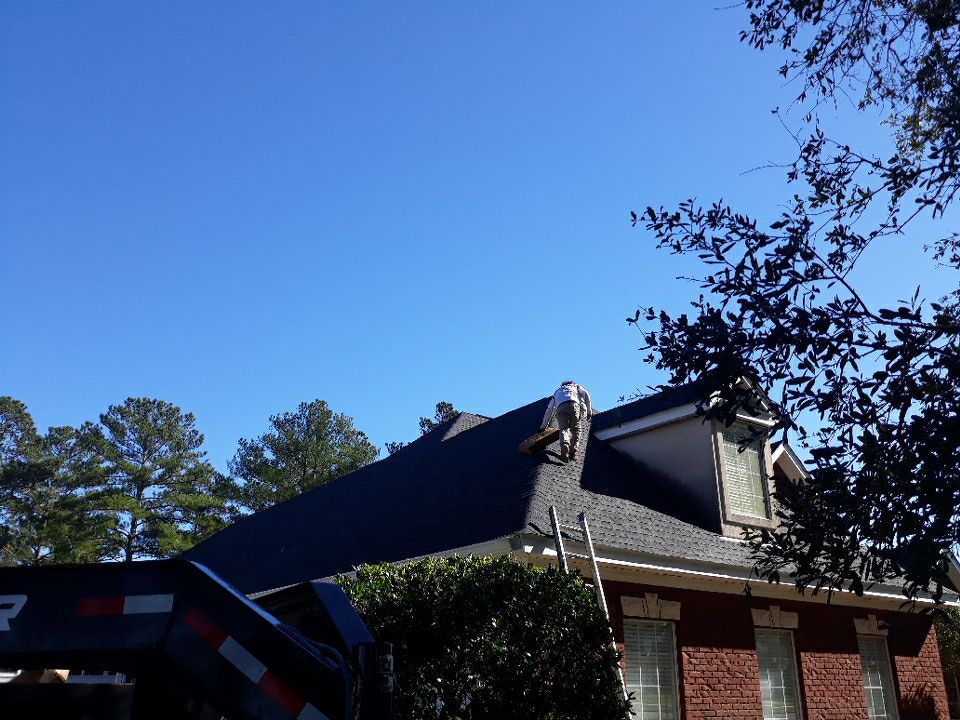 Residential Roofing Installation using Roof Replacement by American Roofing & Construction LLC