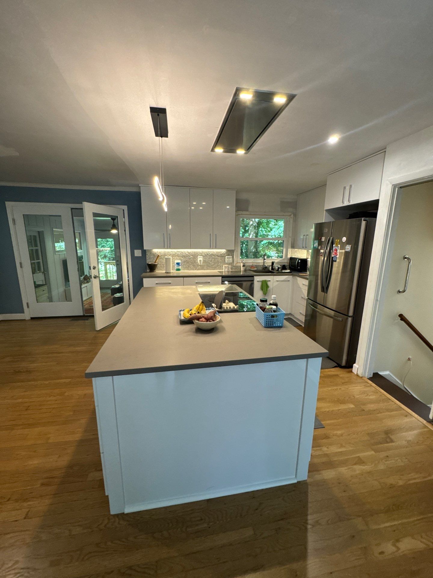 Modern Kitchen Remodeling with Large Central Island in Doraville by Swift Home Renovations