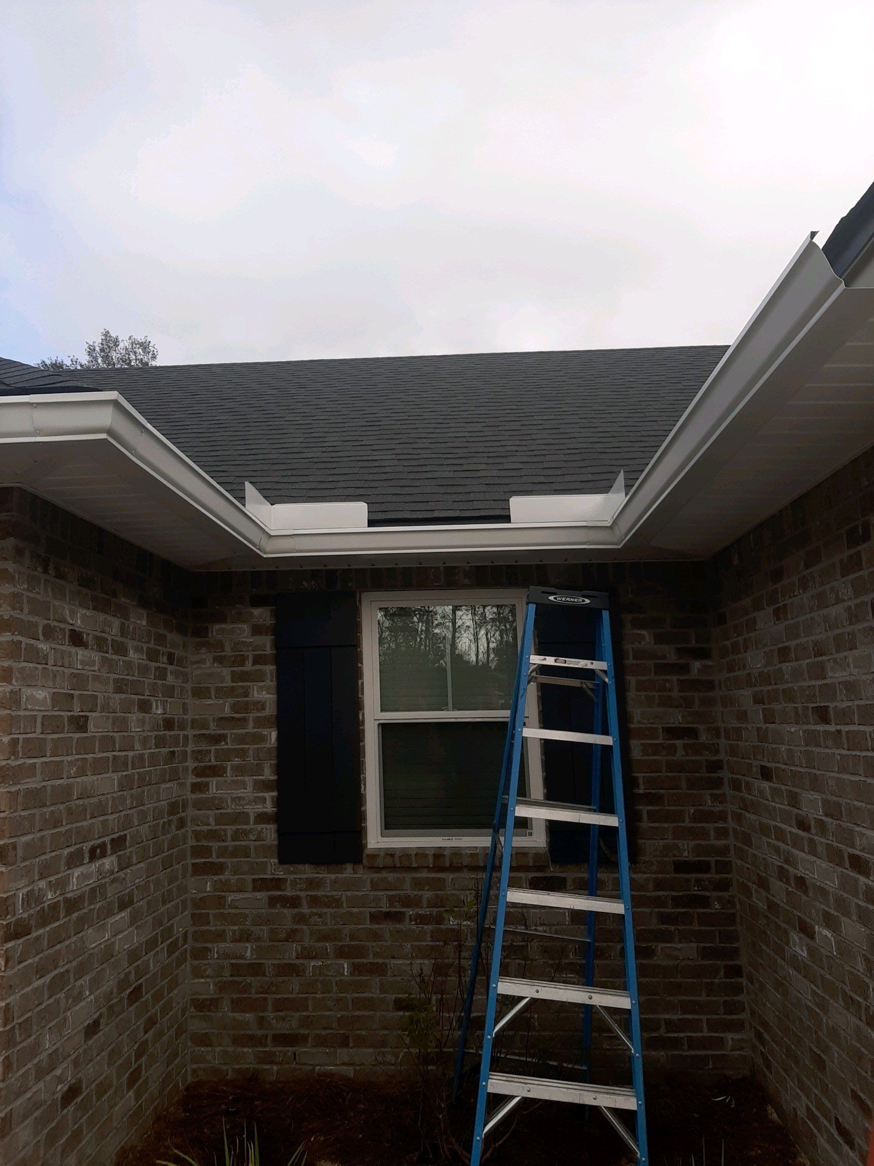 Seamless Gutter Installation Using White K-Style Gutters by Gutter Professors
