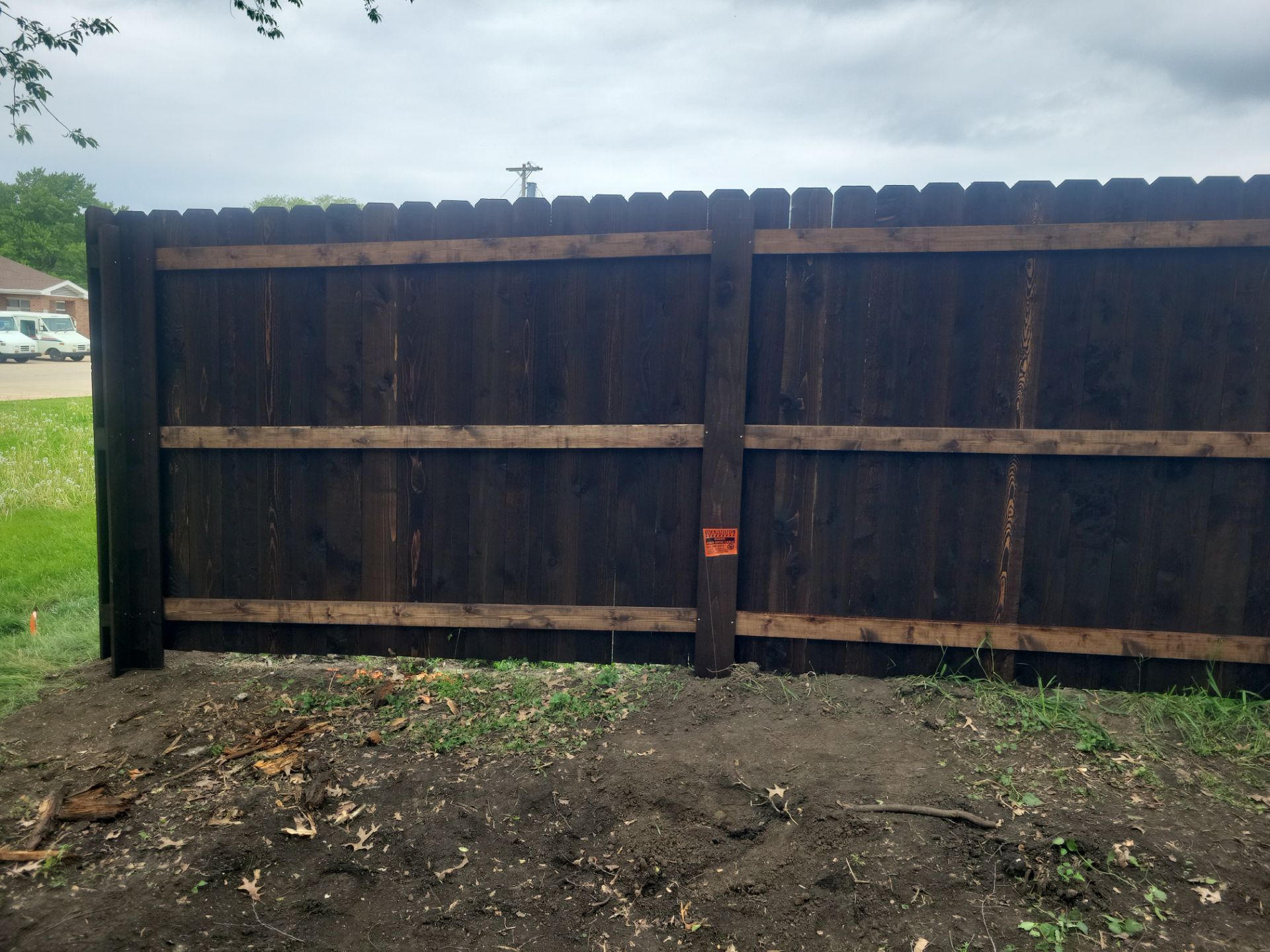 Chain Link and Cedar Privacy in Grundy Center by Perfect Picket Fence and Stain
