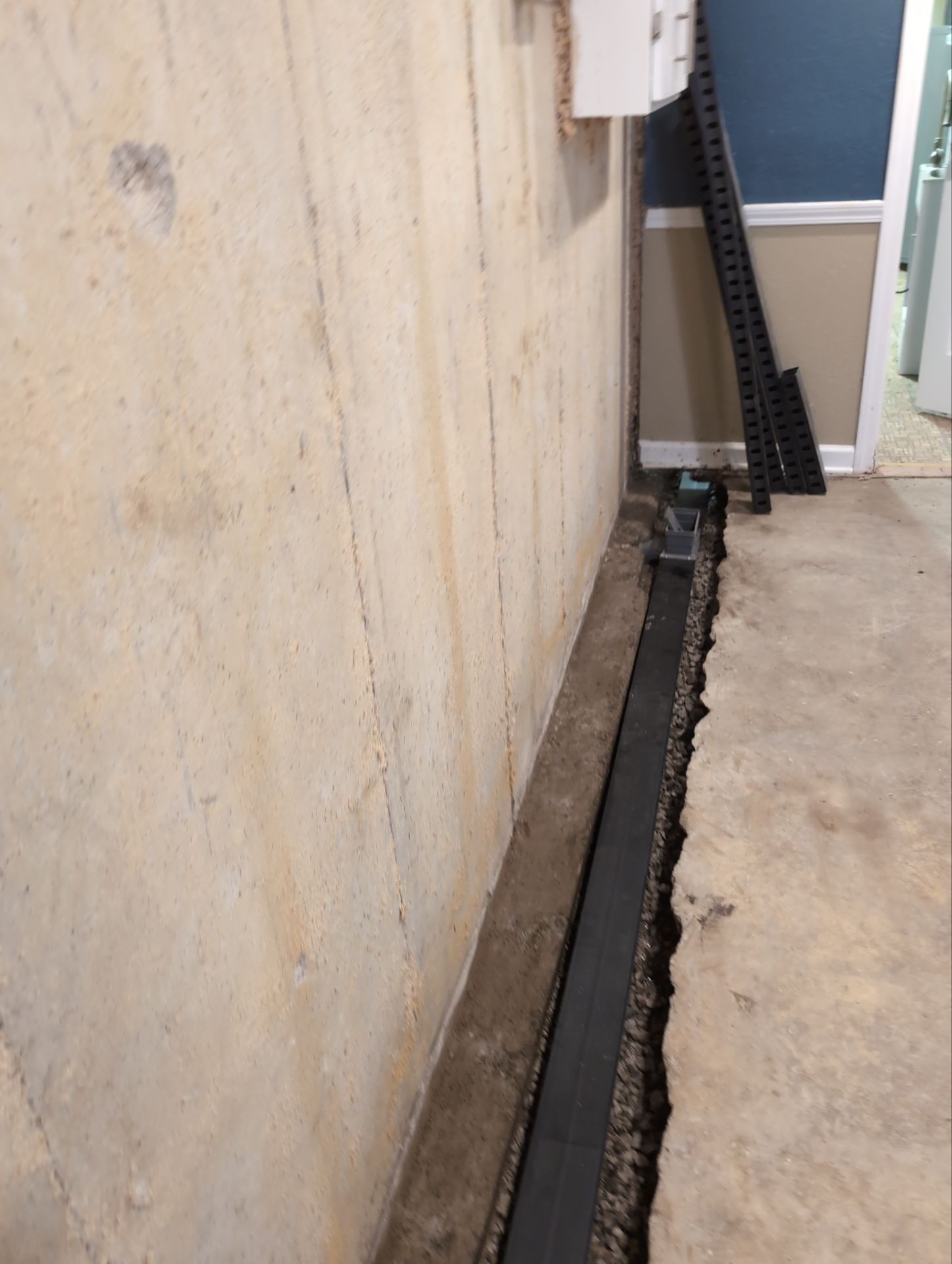 Interior Basement Waterproofing System and Egress Window Installation by Toledo Basement Repair 