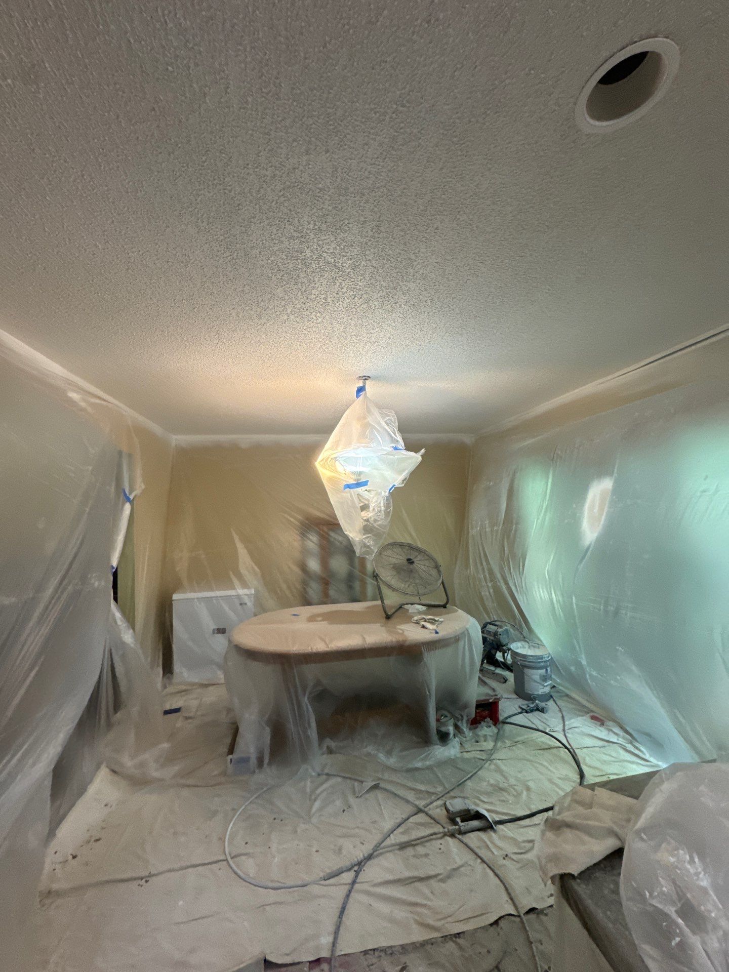 Norton Shores Kitchen Cabinet Painting and Deck Restoration Project by Gordon Painting