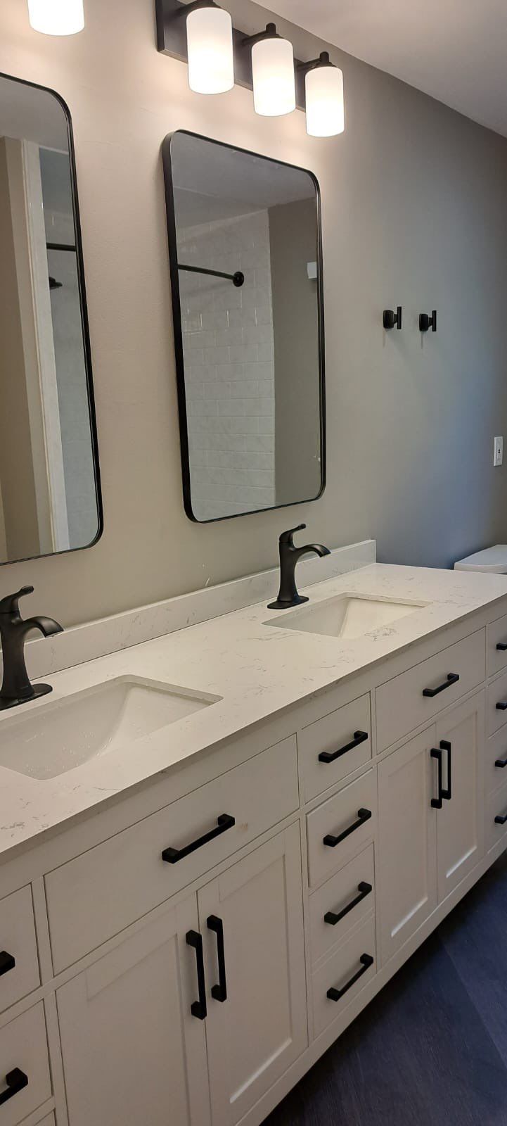 Bathroom Remodel using LVP Flooring by Home Concepts Construction