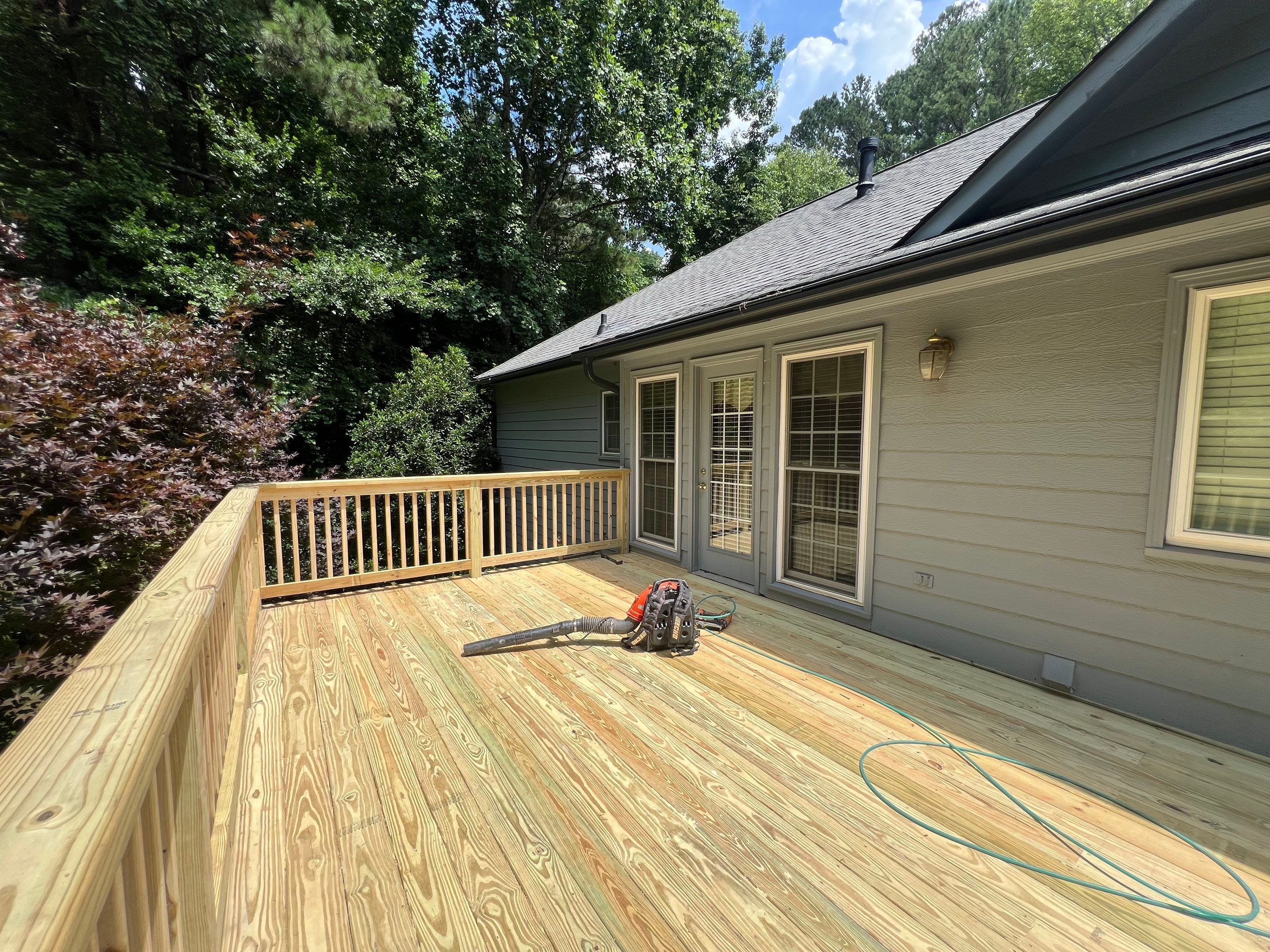 Pressure-Treated Wood Deck Replacement and Staircase Installation in Kennesaw by Swift Home Renovations