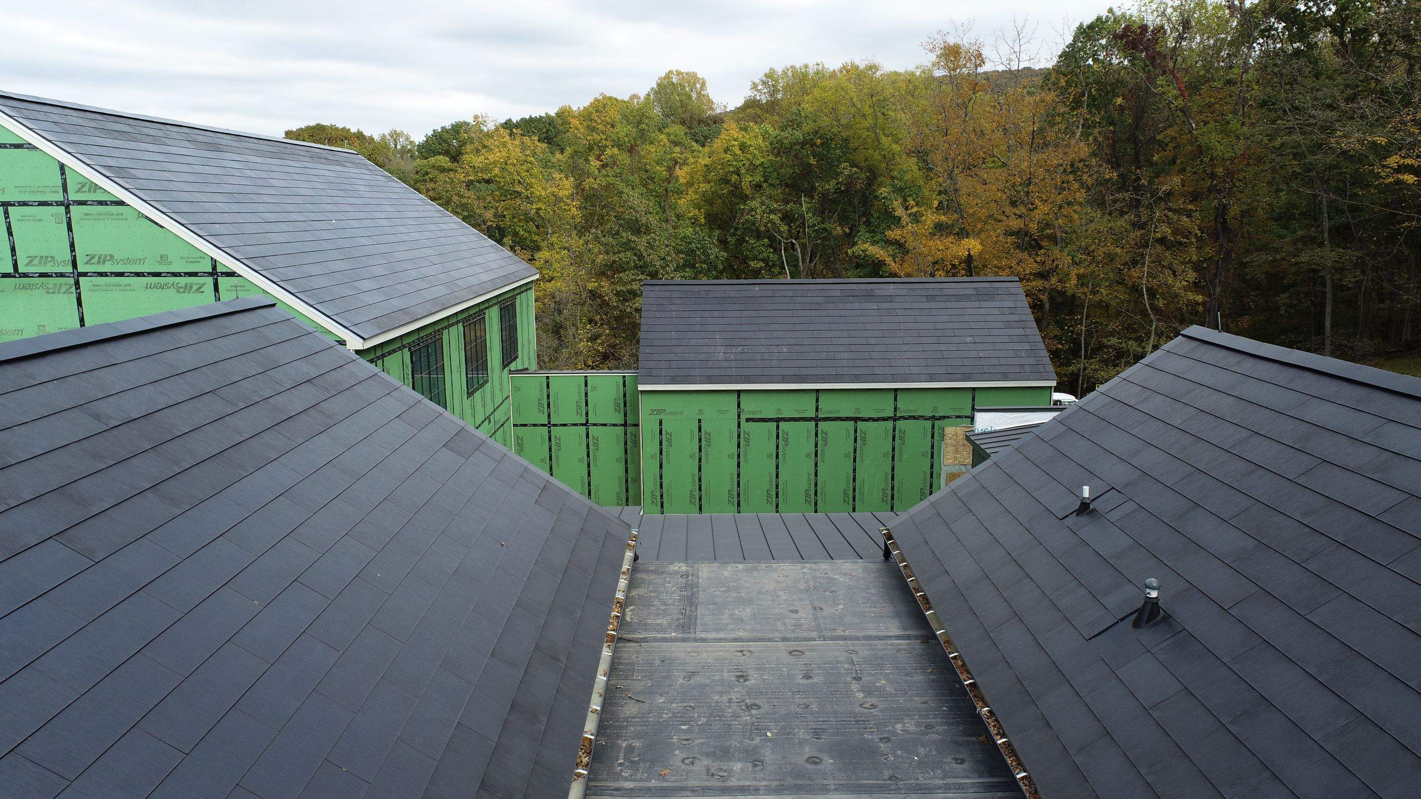 Roof Installation using Tesla Solar Roof V3 by American Home Contractors