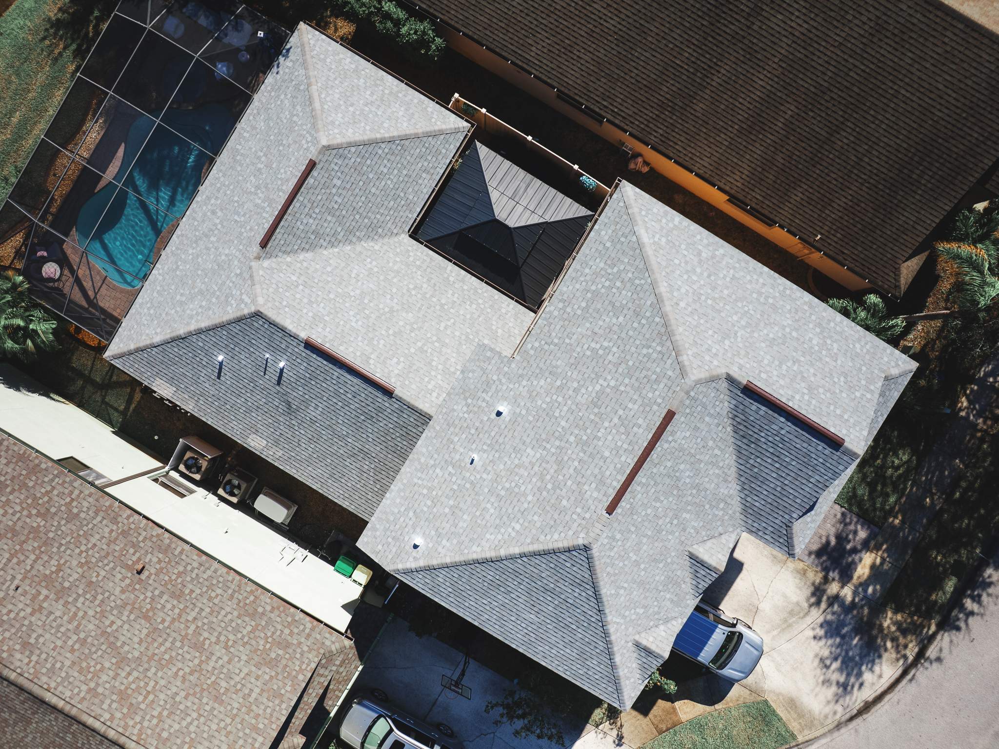 Merritt Island Roof Replacement for Two-Story Home Using Architectural Shingles by Wiedmann Construction & Roofing