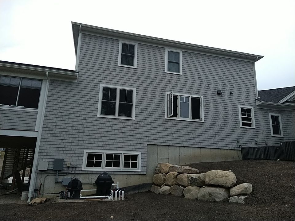 K-Style Gutter Installation with Round Downspouts in Marshfield, MA by Gutter Pro Enterprises
