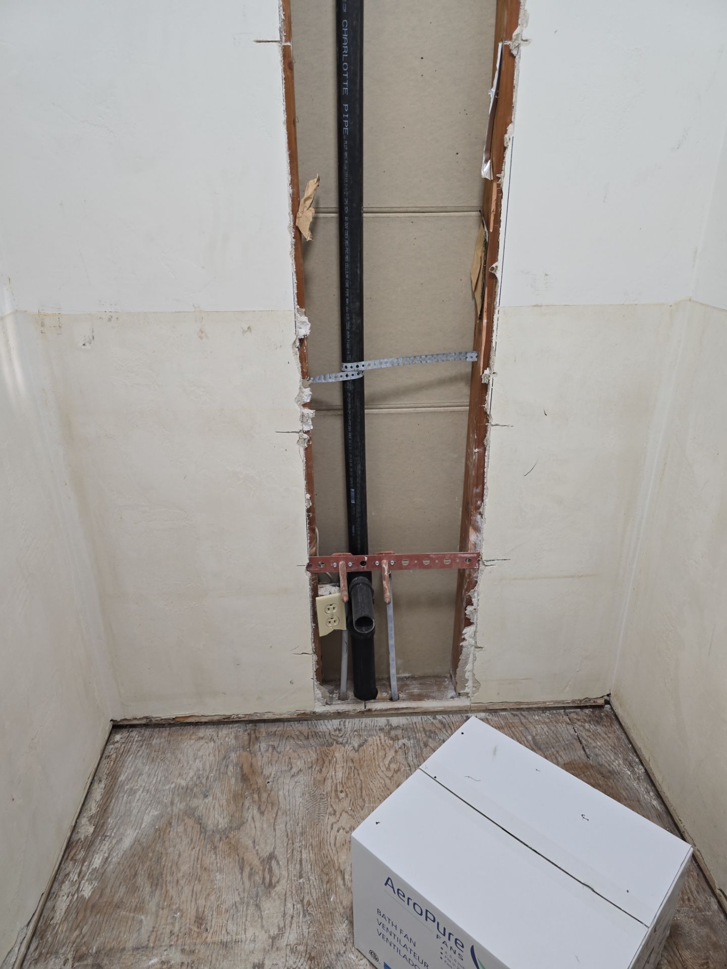 Installation of New Tall Black Piping (Wall to Ceiling) & Underground Piping by Us Plumbing