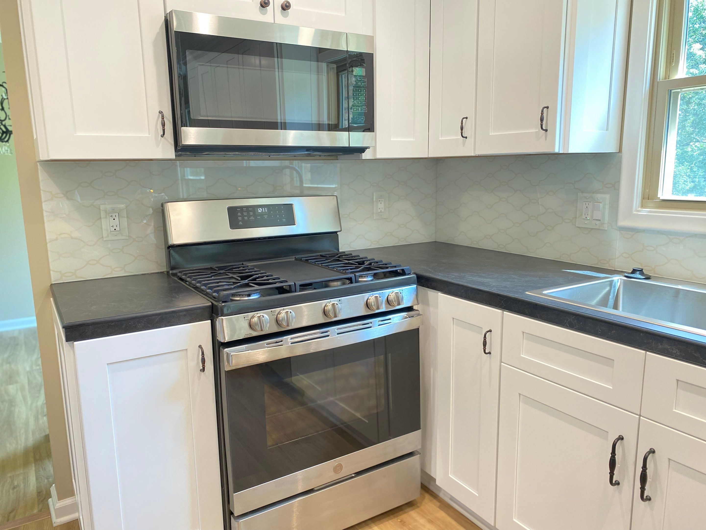 Kitchen Remodel using IMAGIO Arabesque Drops Solid Glass Backsplash by IMAGIO