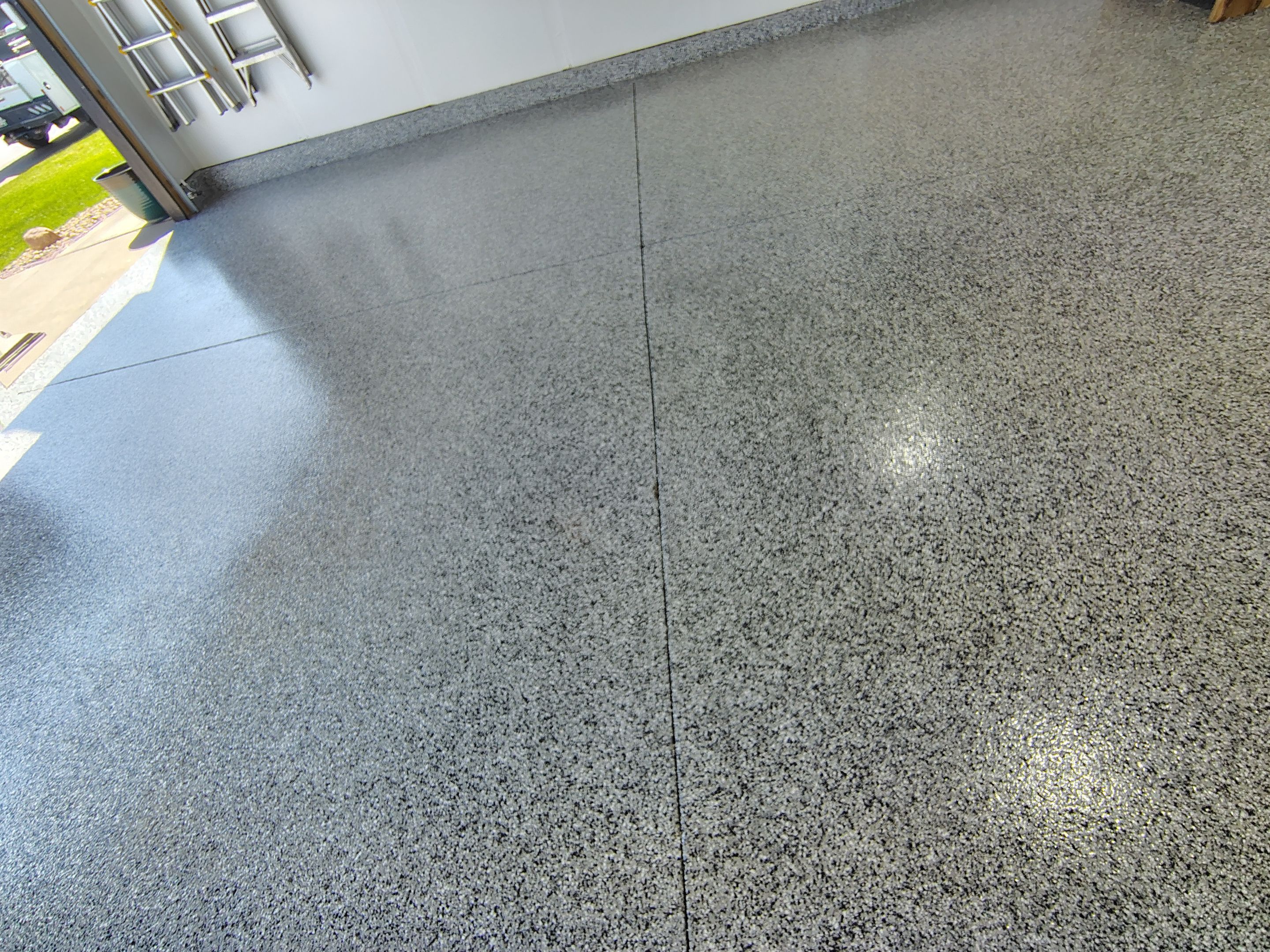 Decorative Flake Garage Floor Coating Installation in Tea, South Dakota by Select Painting, Coatings & Garage Cabinets