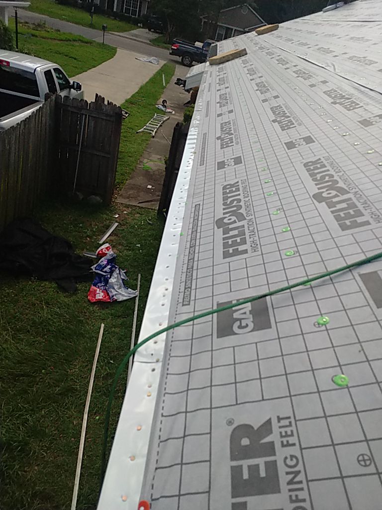 Residential Roofing Installation using Roof Replacement by American Roofing & Construction LLC