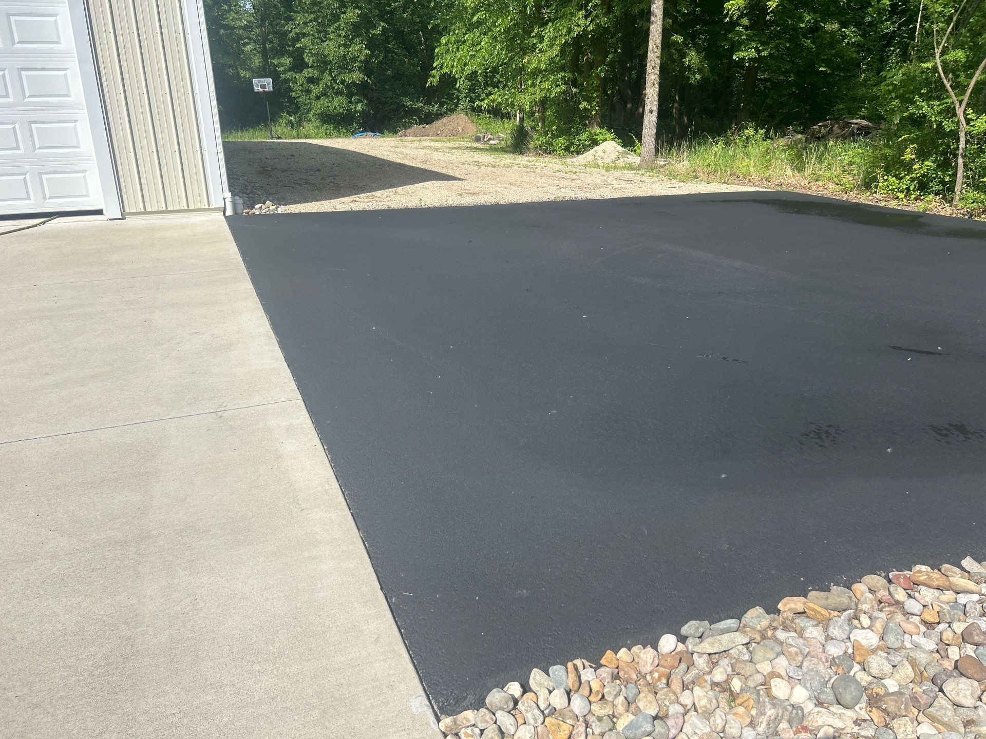 High end residential driveway by Quality Asphalt & Maintenance LLC