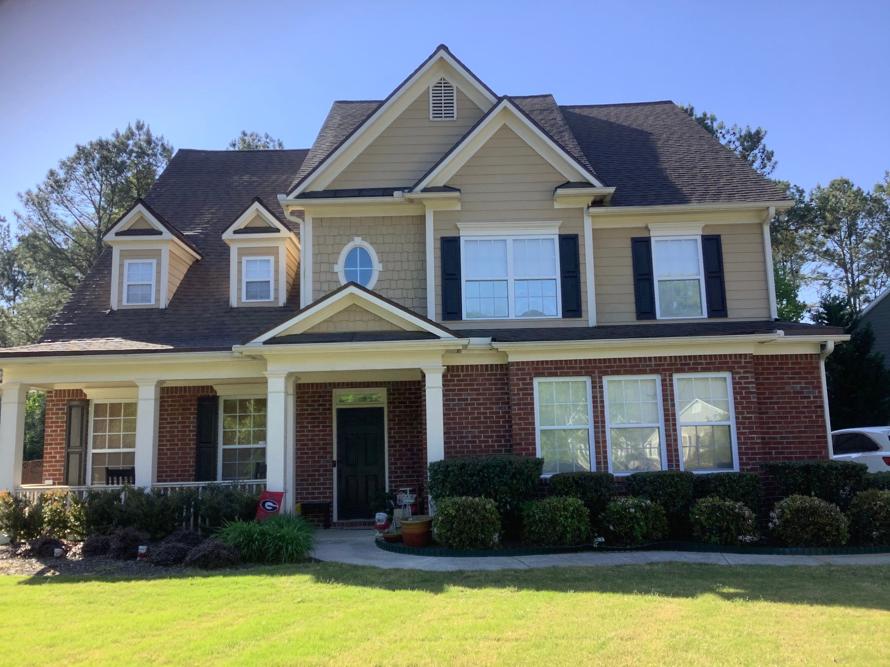 Exterior Home Refresh in Powder Springs with Gray Siding and White Trim by Swift Home Renovations
