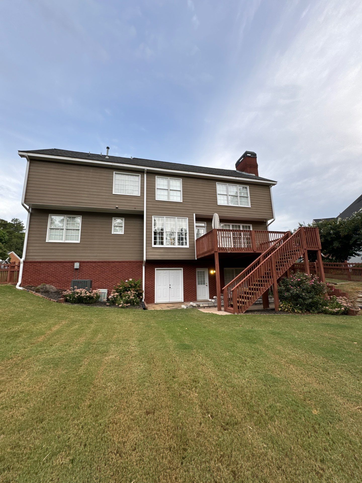 Exterior Painting and Gutter Replacement in Powder Springs by Swift Home Renovations