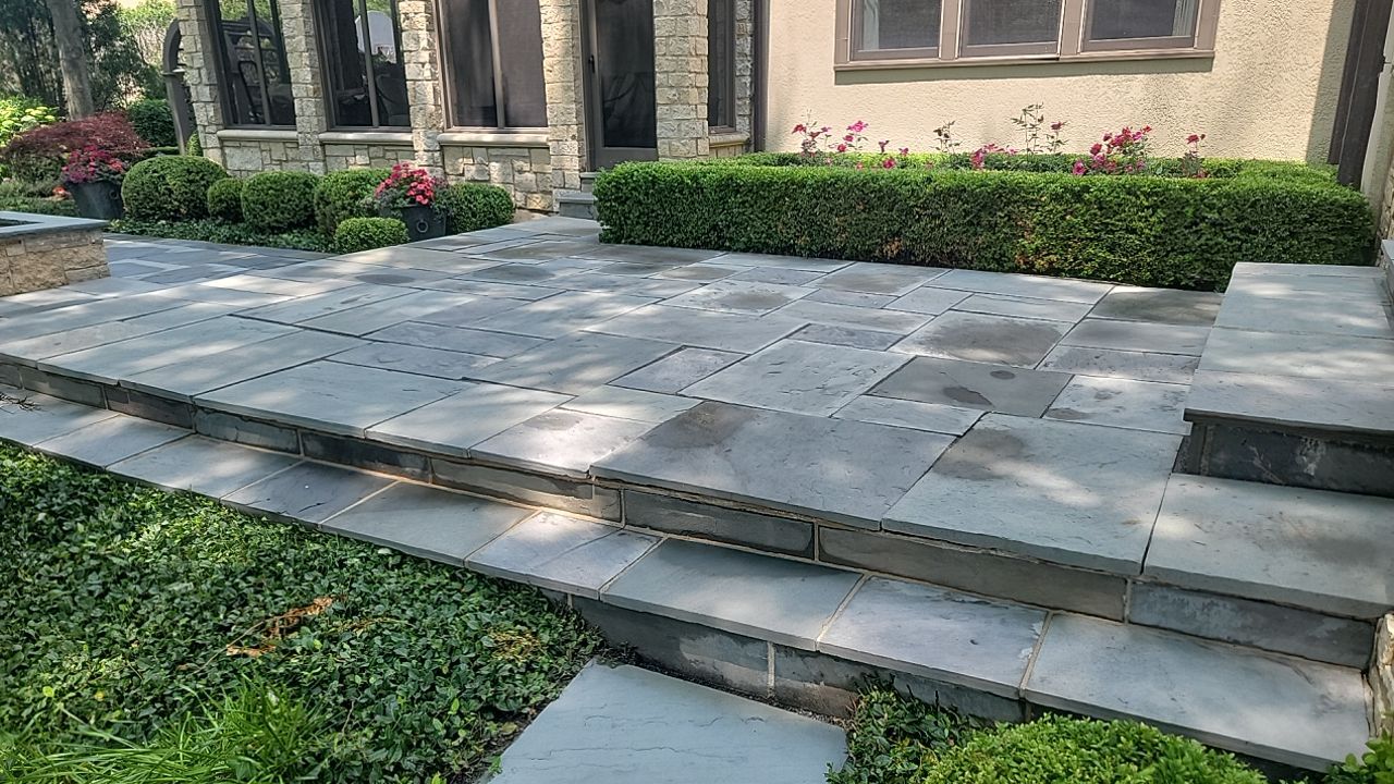 Northbrook, IL stucco home soft wash and stone cleaning by Northern Power Washing LLC.