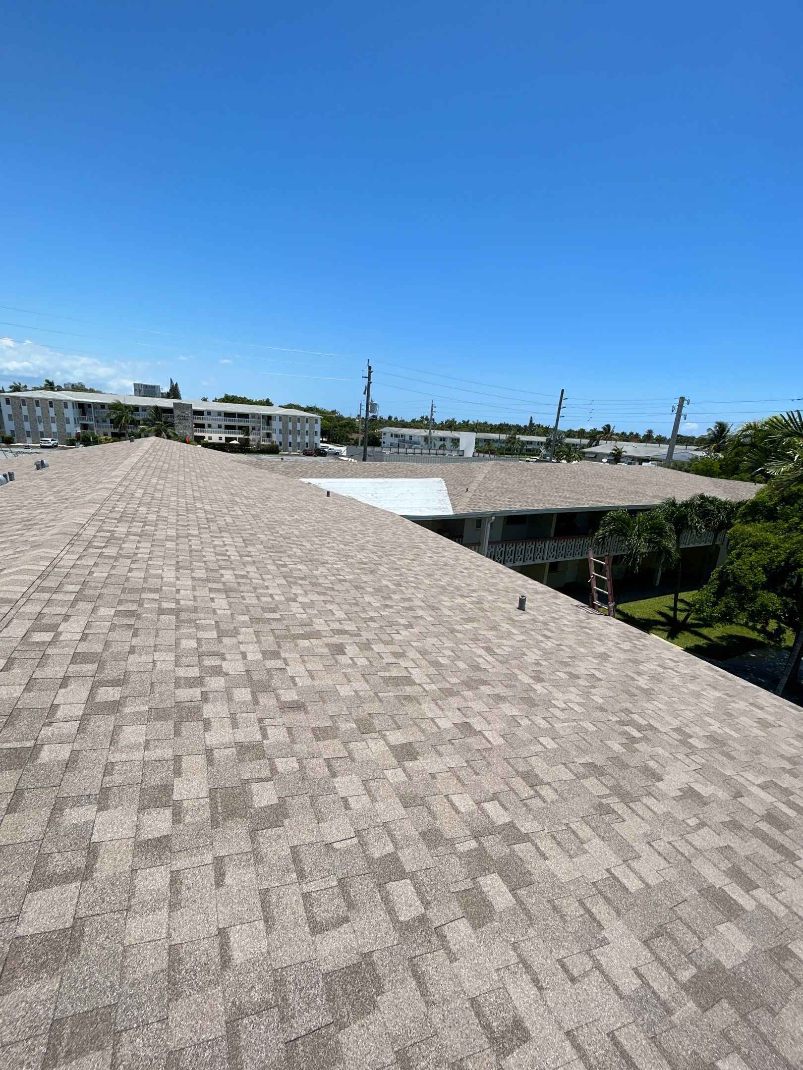 Commercial Roofing Installation using CERTAINTEED LANDMARK AR (SUNRISE CEDAR) by Earl W. Johnston Roofing 