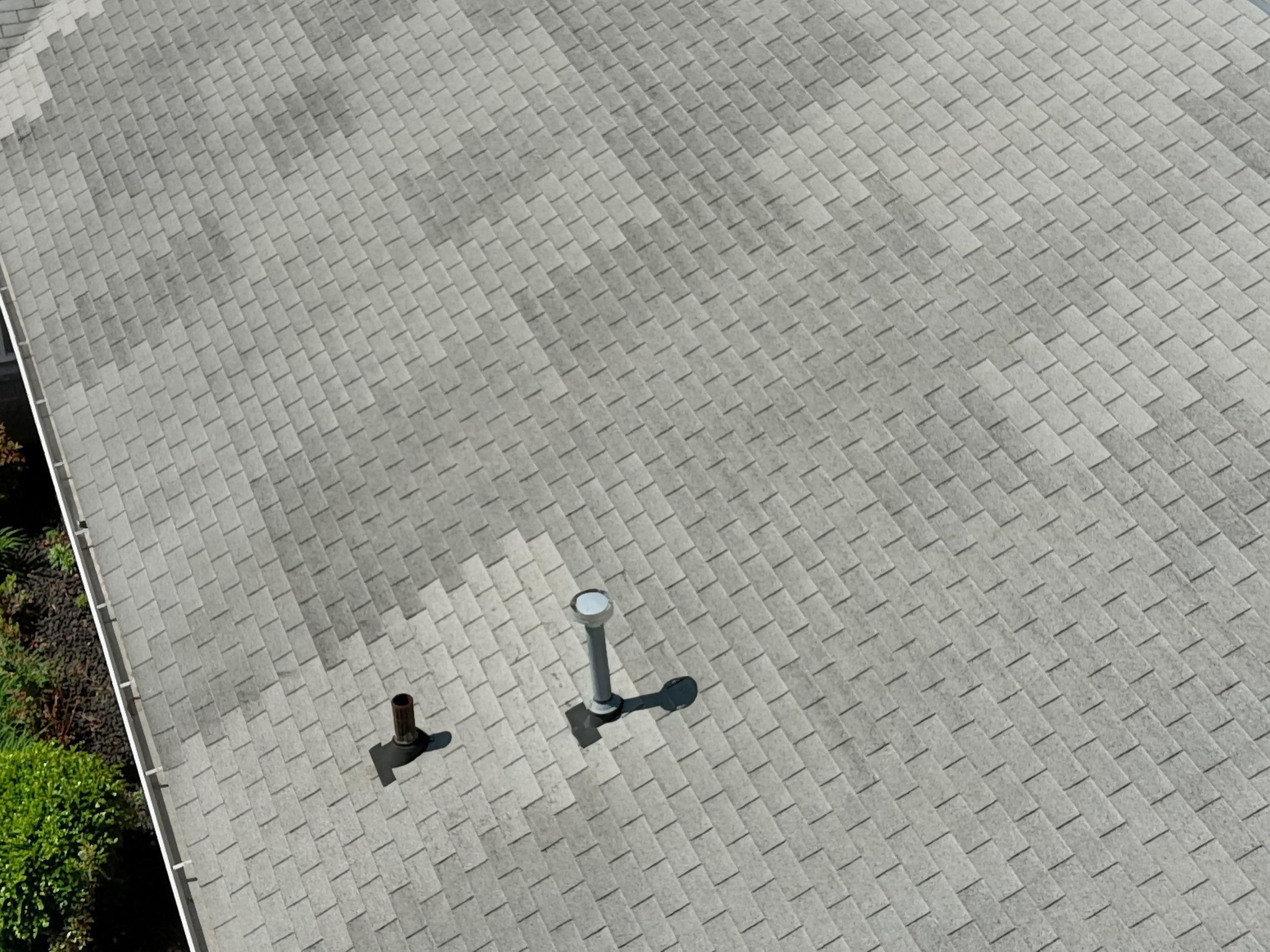 Commercial Roofing Installation using Performance Shingles by Mr. Roofer