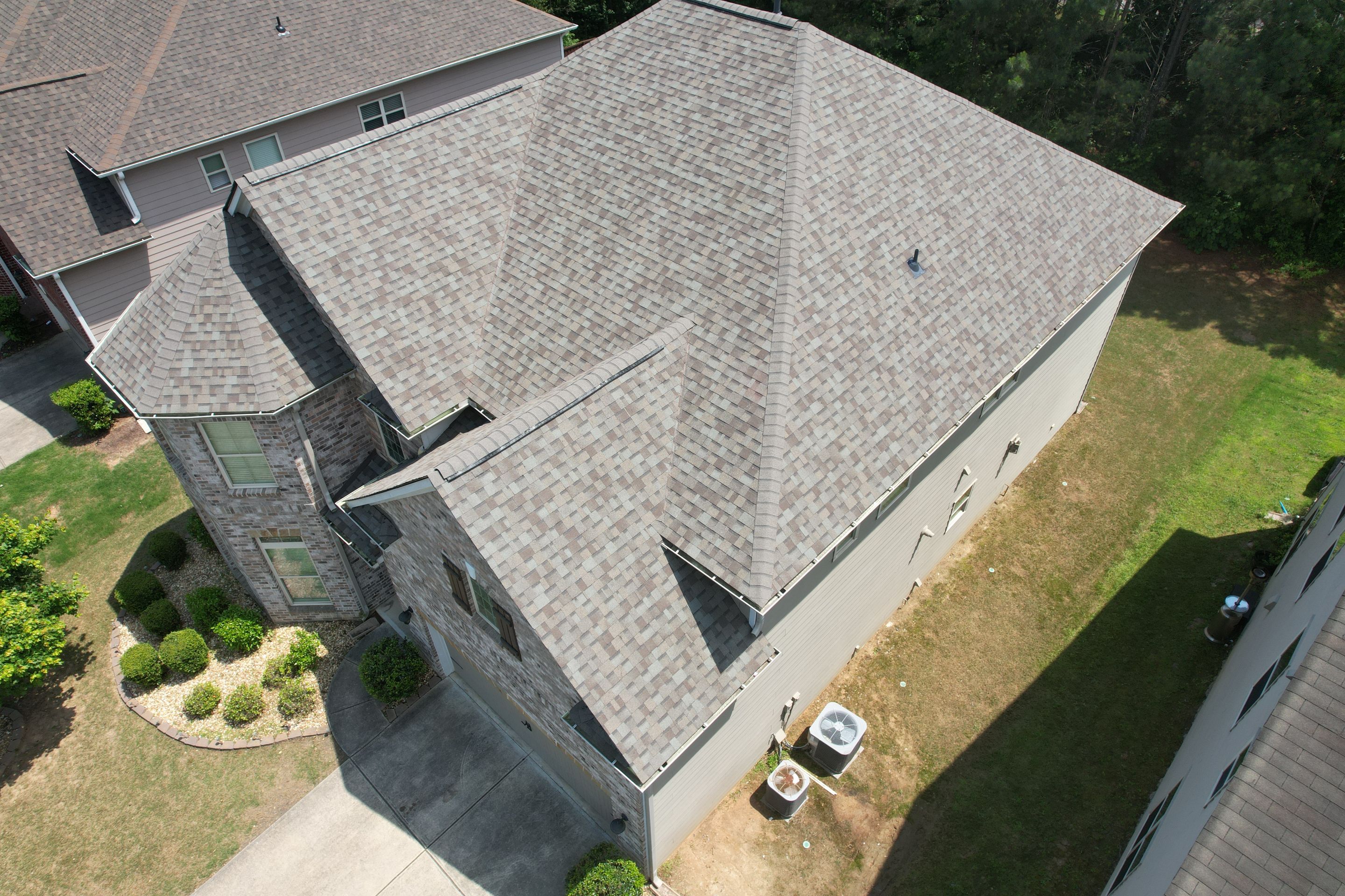Residential Roof Replacement using Owens Corning TruDef Driftwood by Inspector Roofing and Restoration