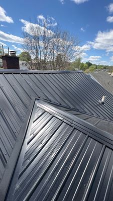 Residential Roofing Installation using Metal