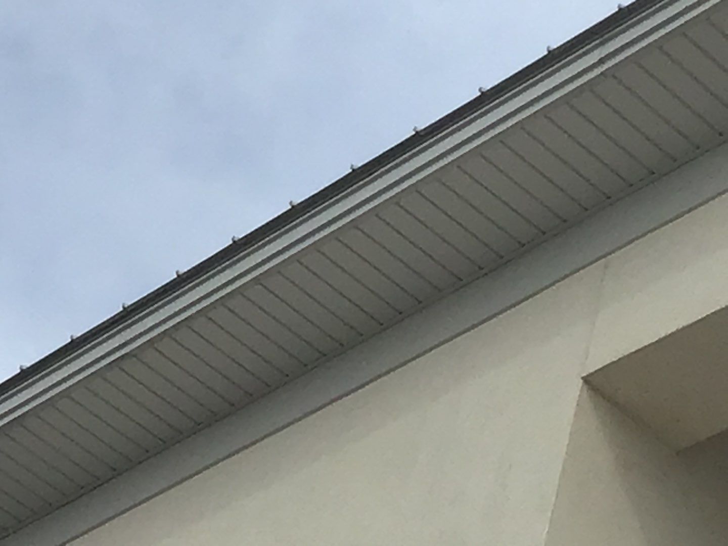 Soffit and Fascia Roof Replacement using 60' Ladders in Navarre by Gutter Professors